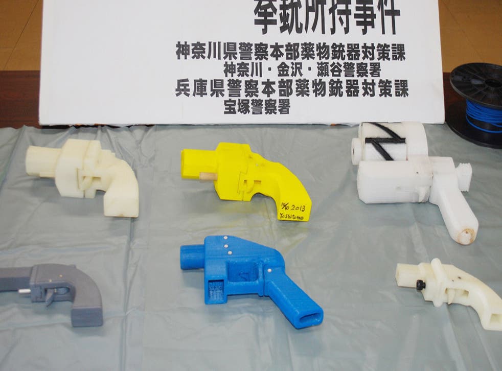 A number of guns seized from Imura's house by Yokohama police in May 2014. Image: Jiji Press/Getty/AFP