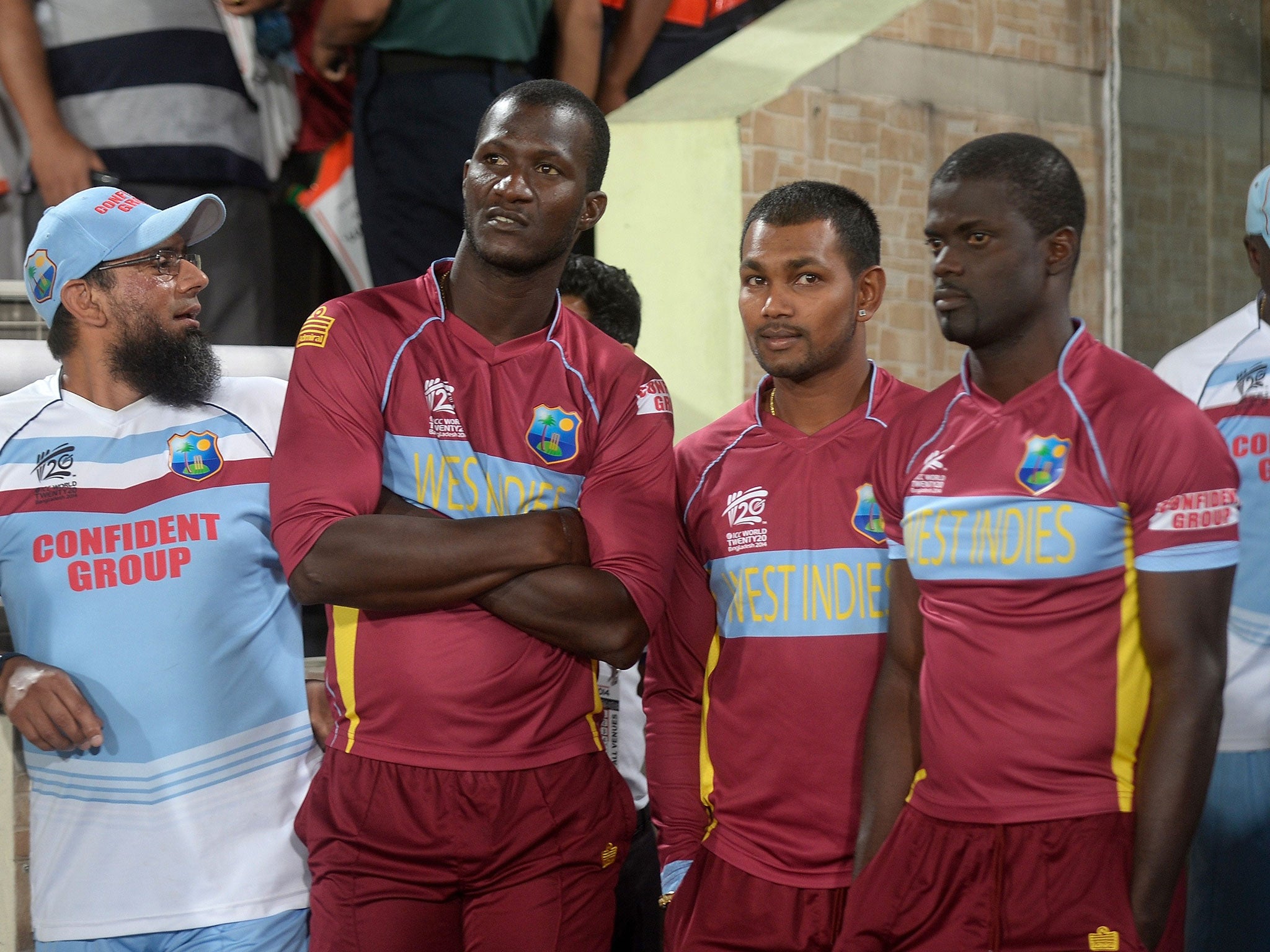 Darren Sammy alongside his West Indies team-mates
