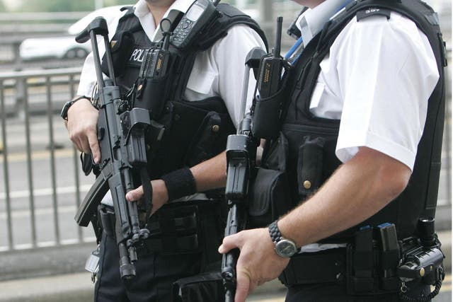 Two gunmen are still at large as the Home Secretary orders increased border security