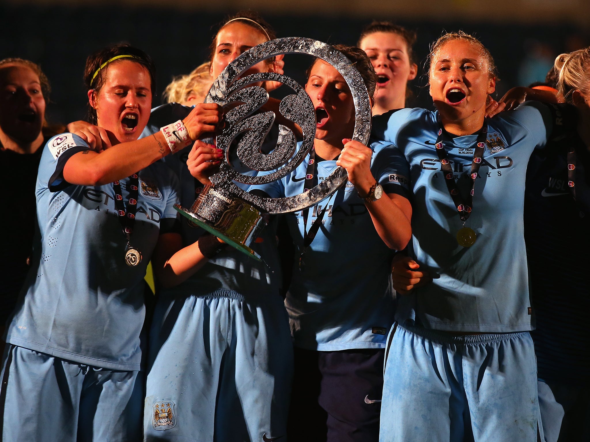 Manchester City celebrate winning the WSL