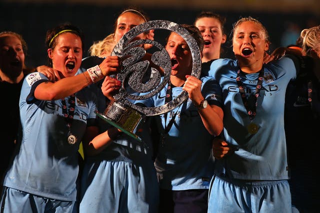 Manchester City celebrate winning the WSL