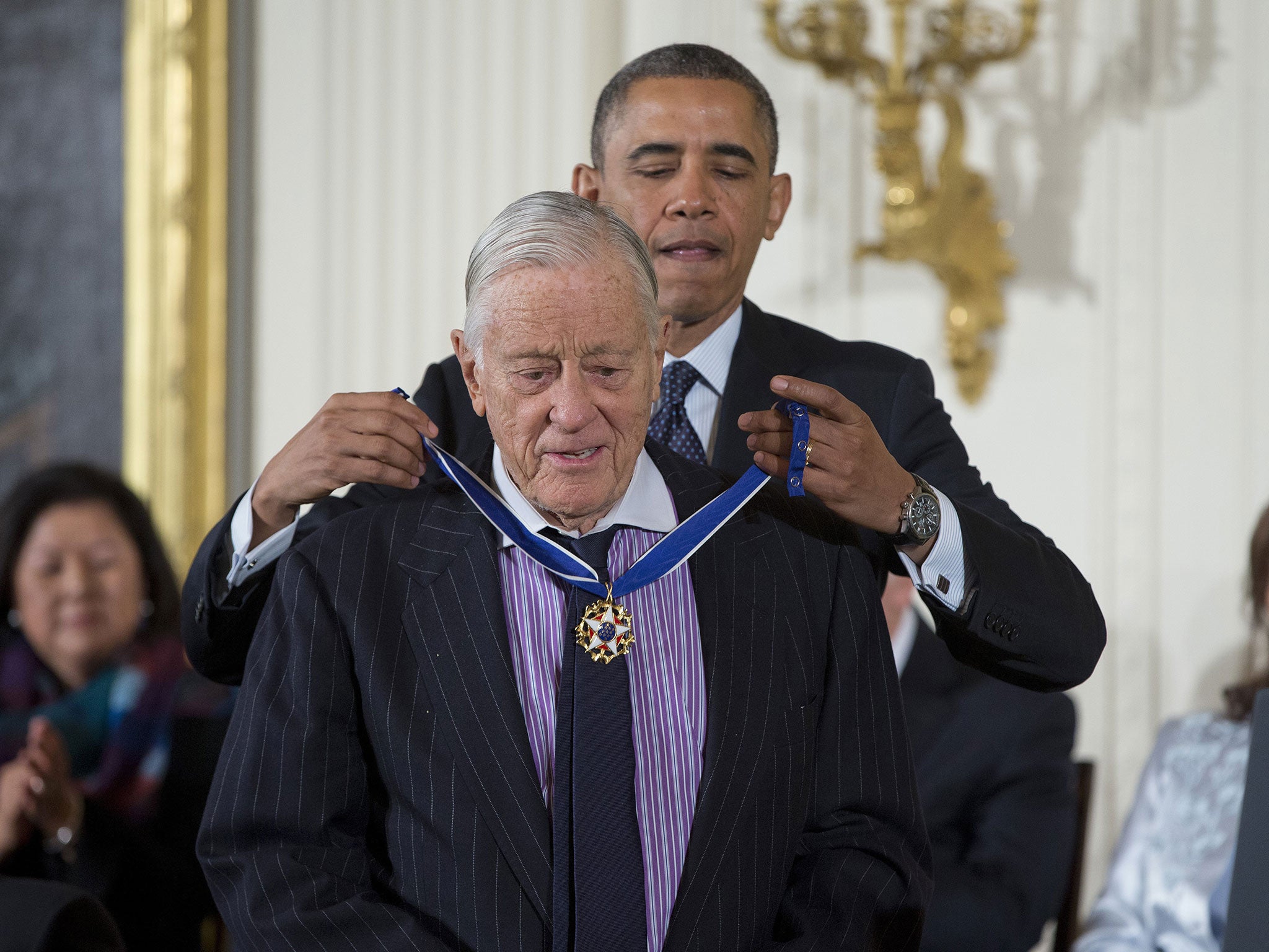 President Barack Obama awards former Washington Post executive editor Ben Bradlee with the Presidential Medal of Freedom at the White House in November 2013