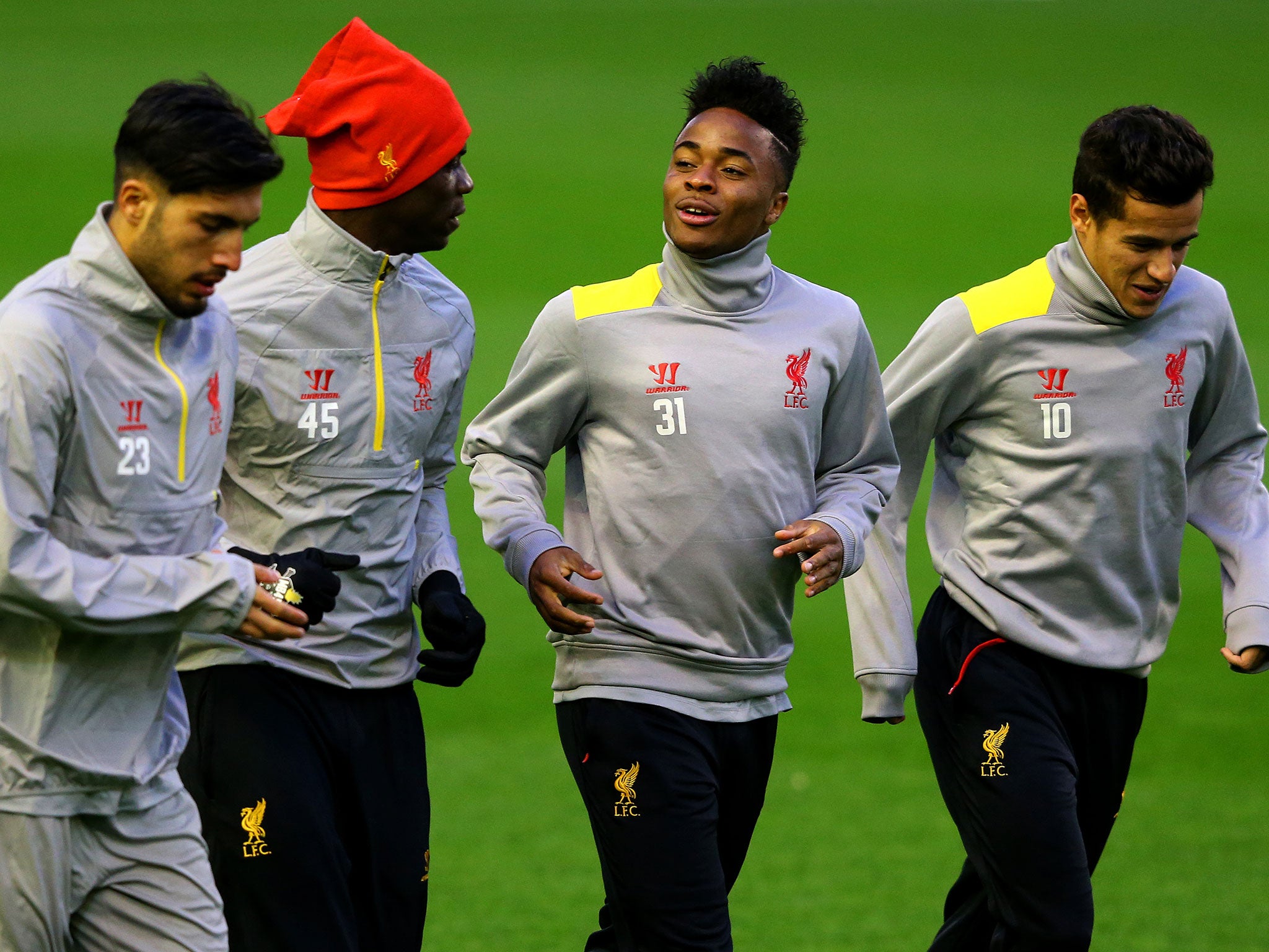 Emre Can, Mario Balotelli, Raheem Sterling and Philippe Coutinho of Liverpool warm up during a training session ahead of the match between Liverpool and Real Madrid.