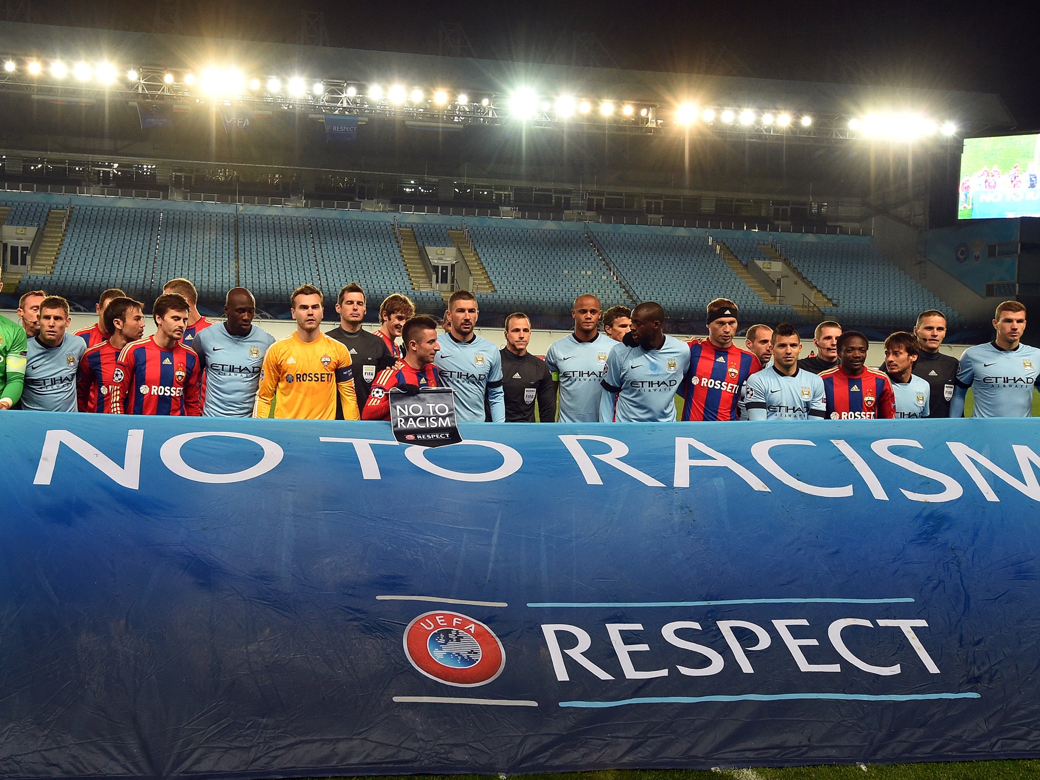 Manchester City and CSKA Moscow with an anti-racism banner