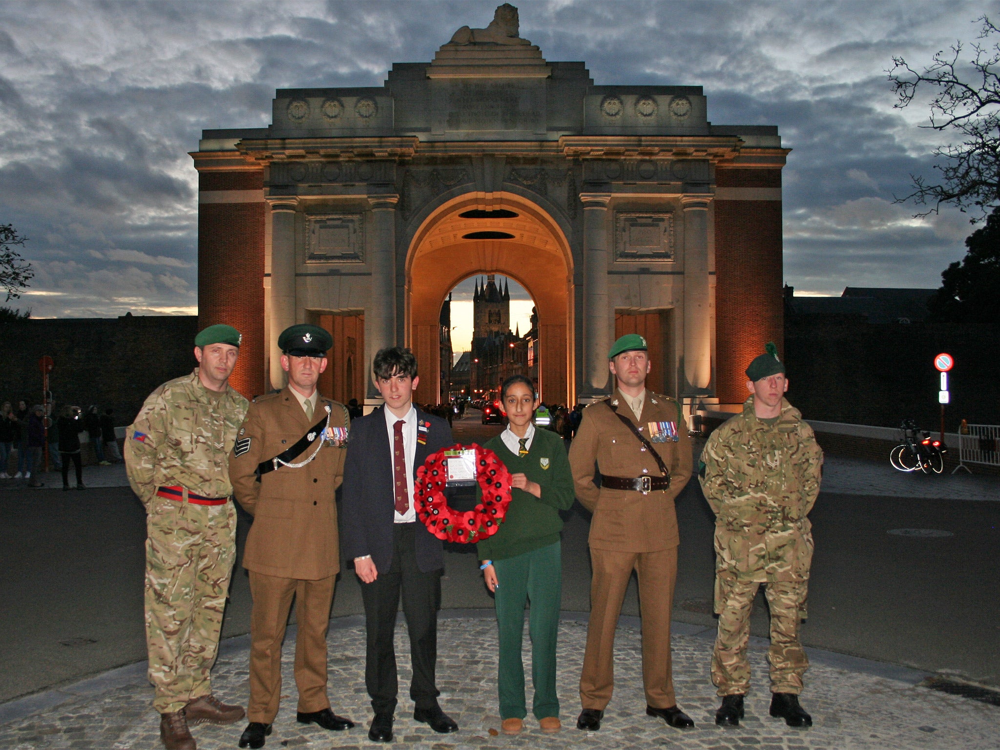 Birmingham pupils Harry McGarrity and Emaan Khan help to lay a wreath at Menin Gate, Ypres