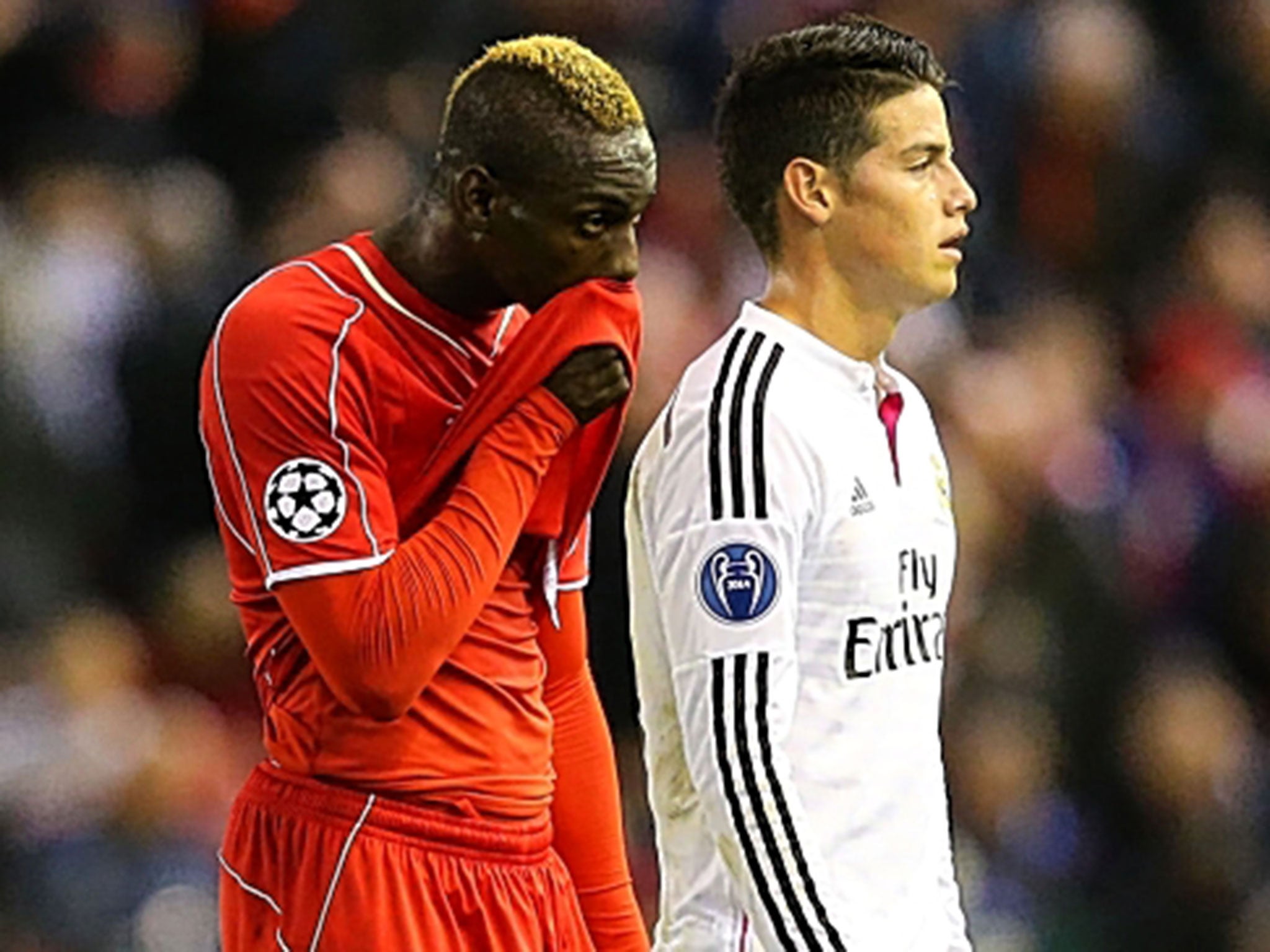 Mario Balotelli (left) trudges off at  half-time last night, to be substituted during the interval
