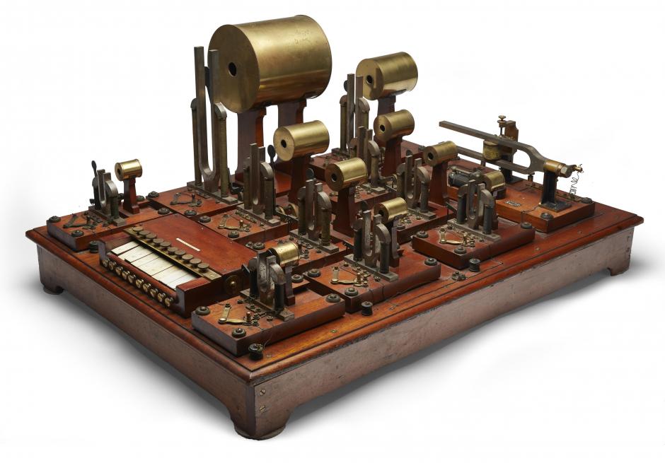 The 1905 Helmholtz Sound Synthesizer is the first ever electric keyboard (see the manual bottom left of the device). Image: Bonhams