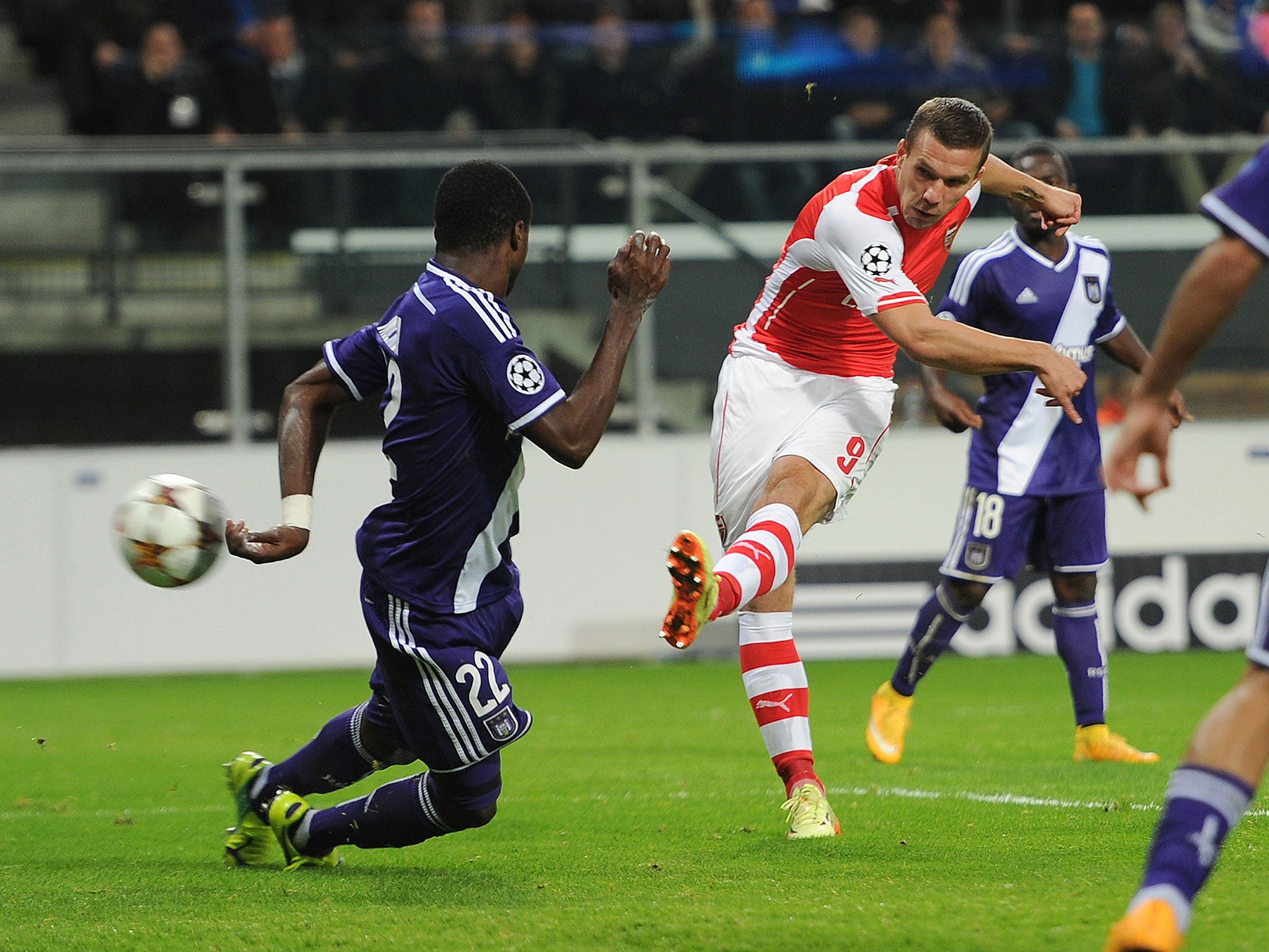 Lukas Podolski fires Arsenal's winning goal last night