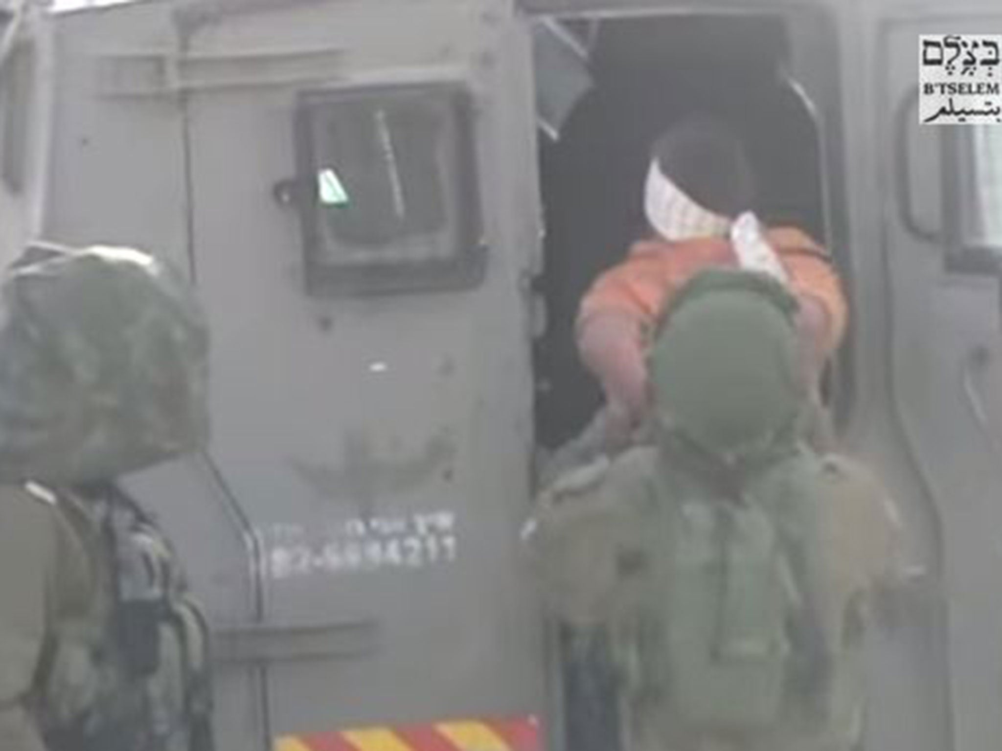 Video footage has emerged of Israeli soldiers detaining a disabled 11-year-old Palestinian boy, accused of throwing stones