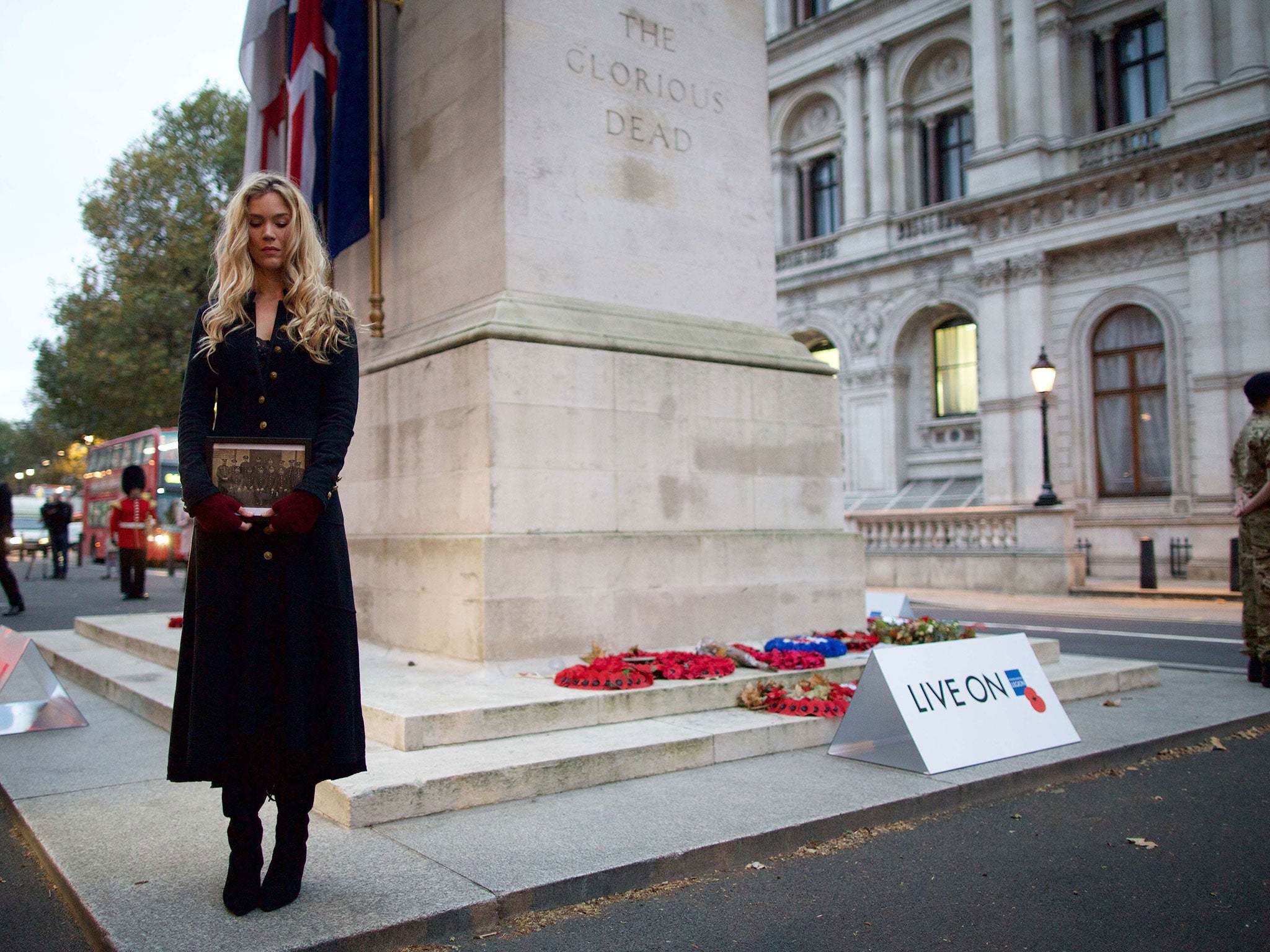 Singer Joss Stone stands beside the Cenotaph in central London