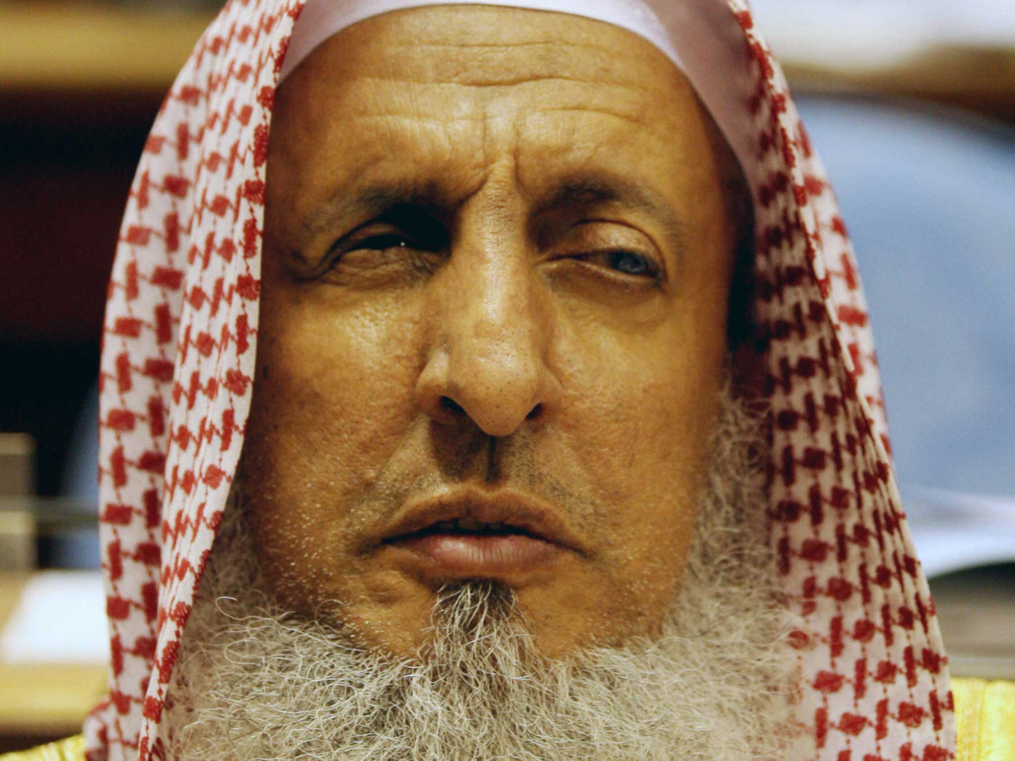 Saudi Grand Mufti Sheikh Abdul Aziz al-Sheikh listens to the speech of Saudi King Abdullah bin Abdul Aziz al-Saud in 2008