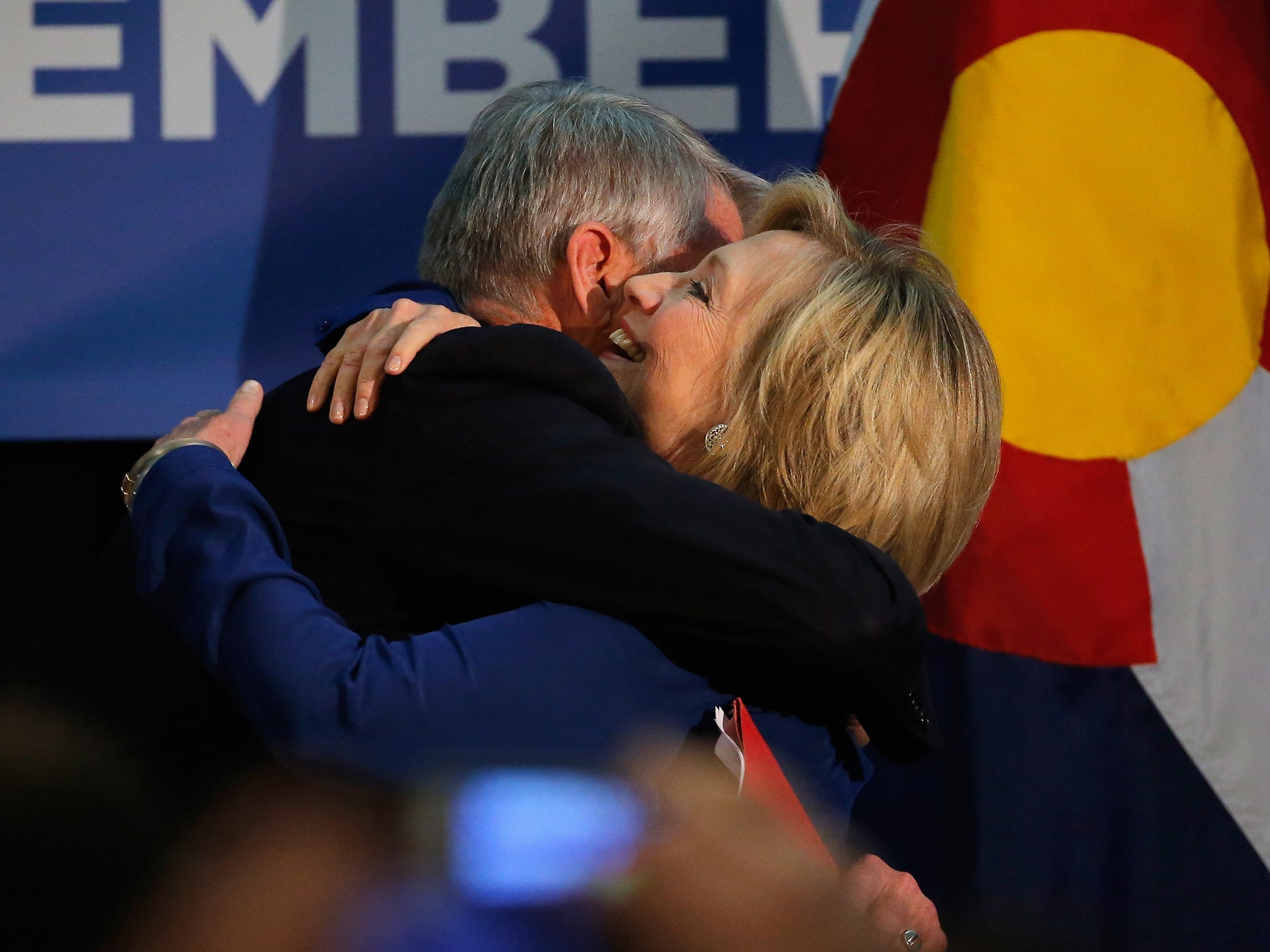 Mark Udall with Hillary Clinton on stage in Aurora on Tuesday