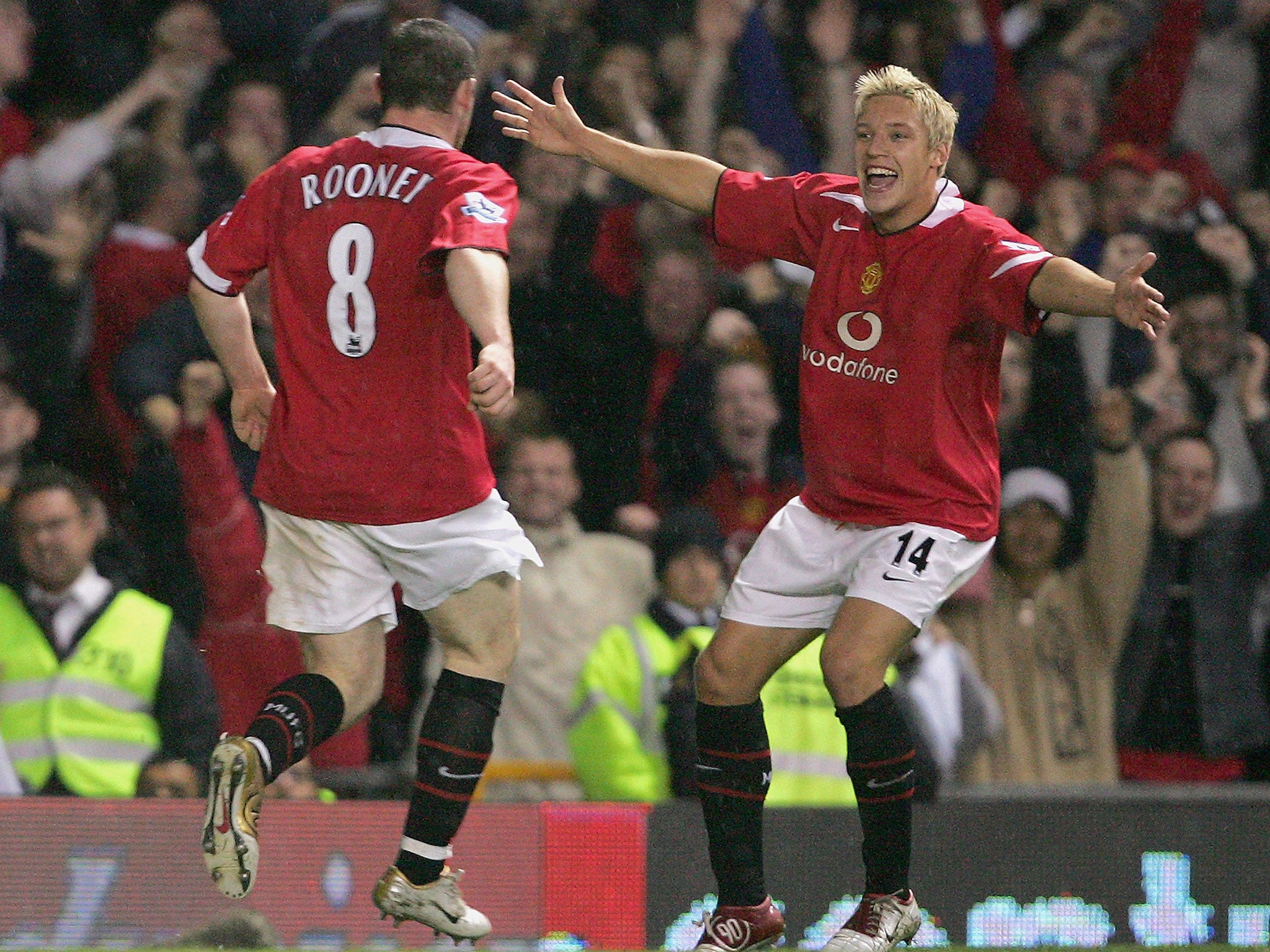 Wayne Rooney celebrates scoring Manchester United's second goal with Alan Smith (right) in their 2-0 win over Arsenal on this day in 2004