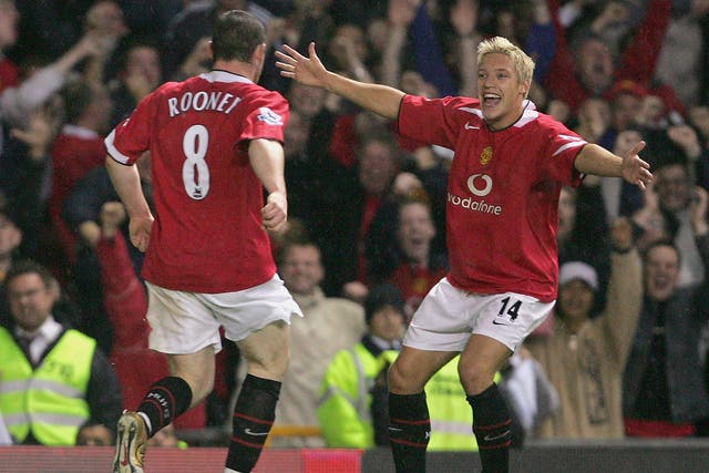 Wayne Rooney celebrates scoring Manchester United's second goal with Alan Smith (right) in their 2-0 win over Arsenal on this day in 2004