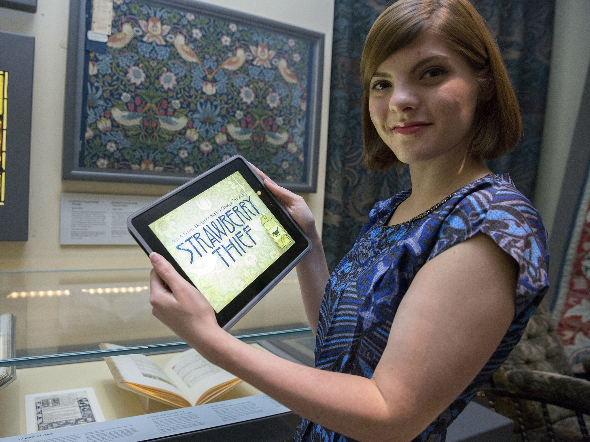 Game Designer in Residence Sophie George with her iPad game inspired by the work of William Morris