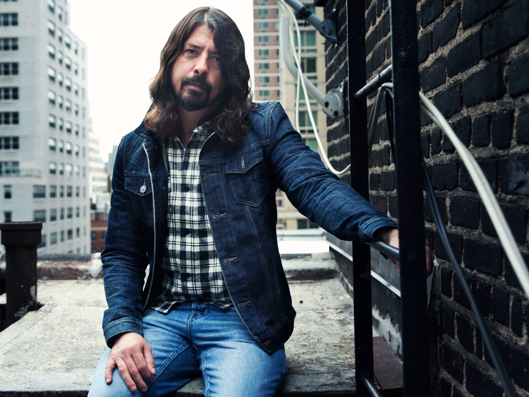 Foo Fighters frontman Dave Grohl will not be removing his music from Spotify anytime soon