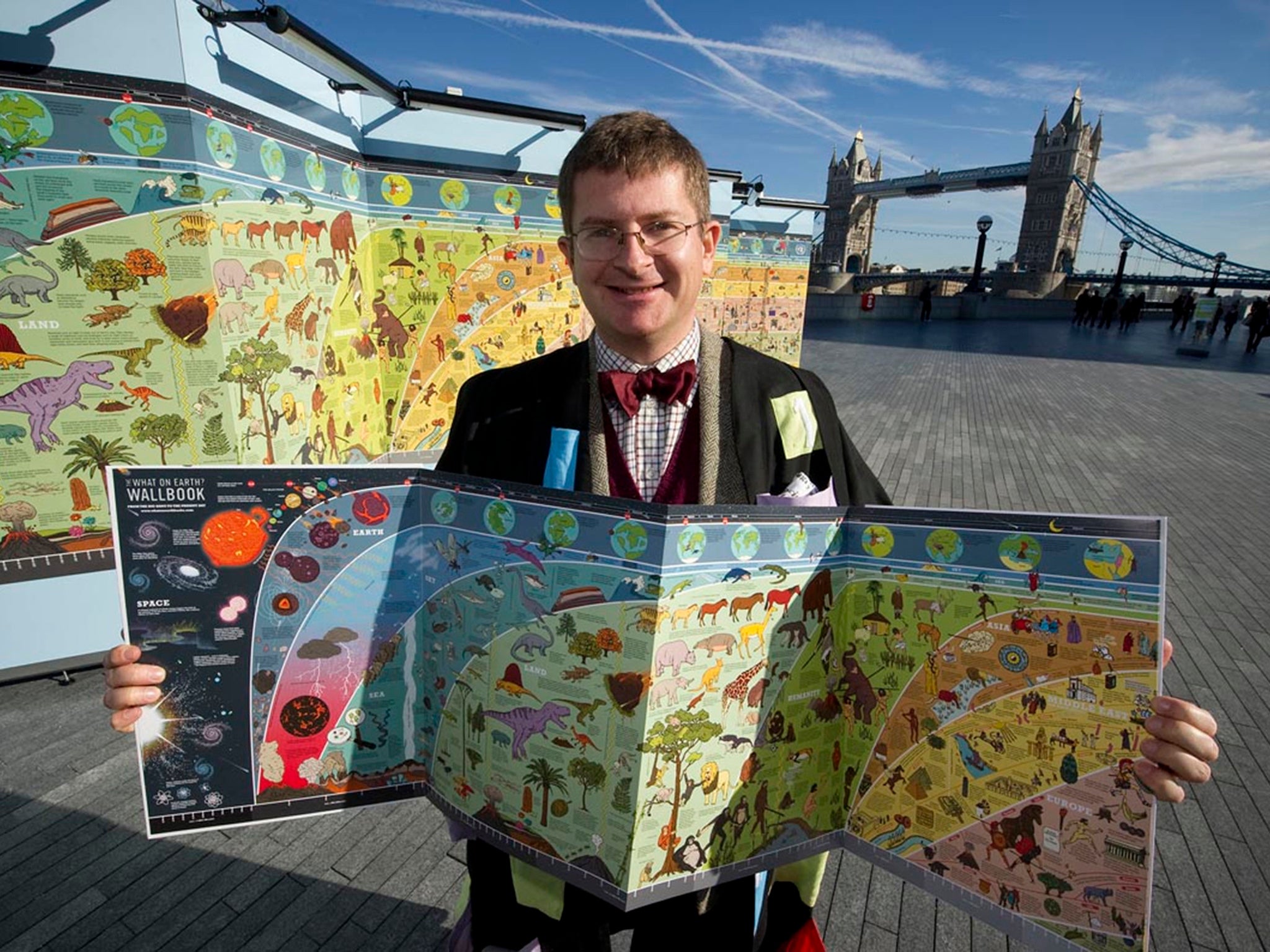 Christopher Lloyd with his WallBook by the Thames near Tower Bridge.