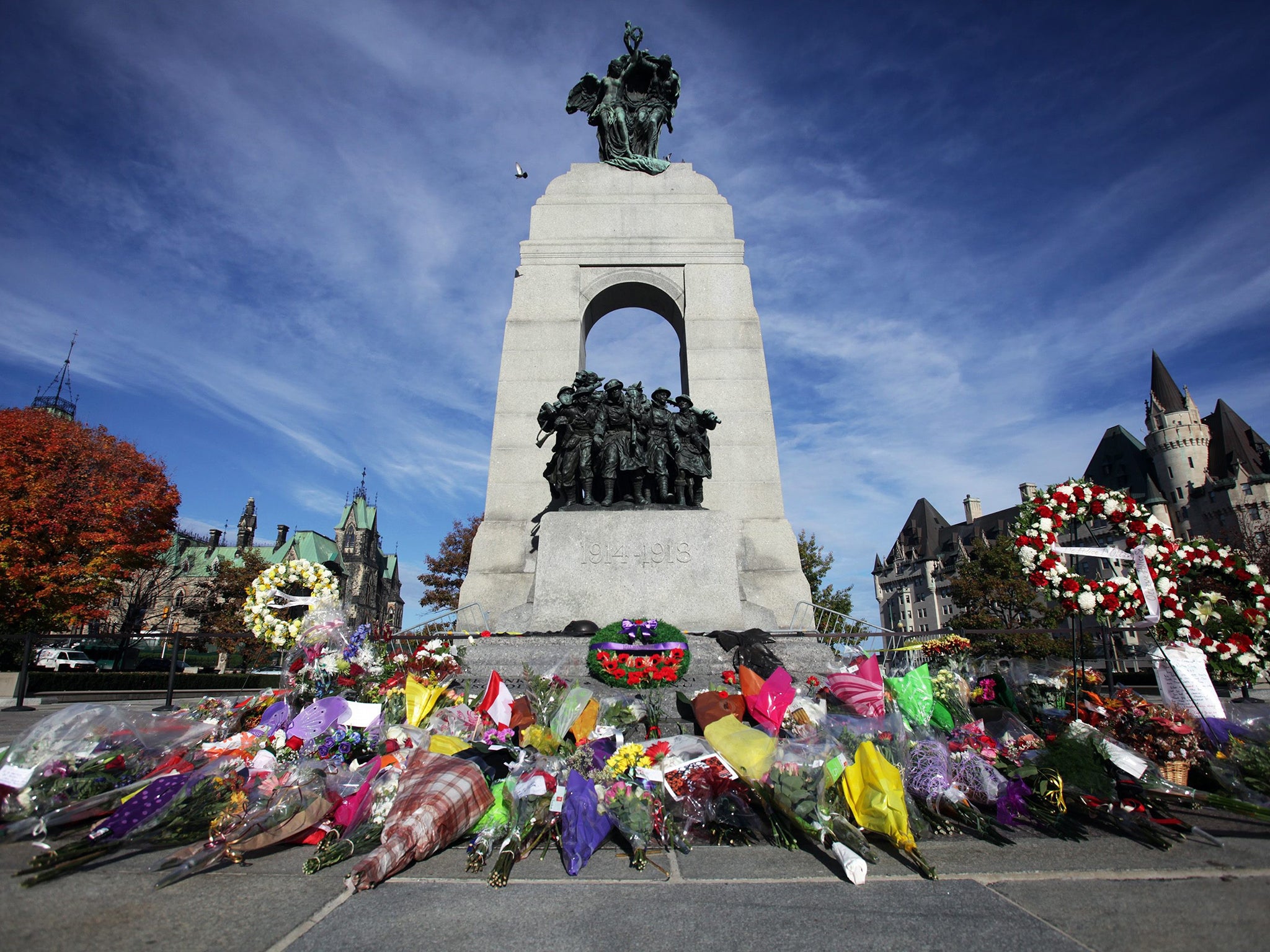 Flowers were left for Corporal Nathan Cirillo at the National War Memorial in Ottawa yesterday