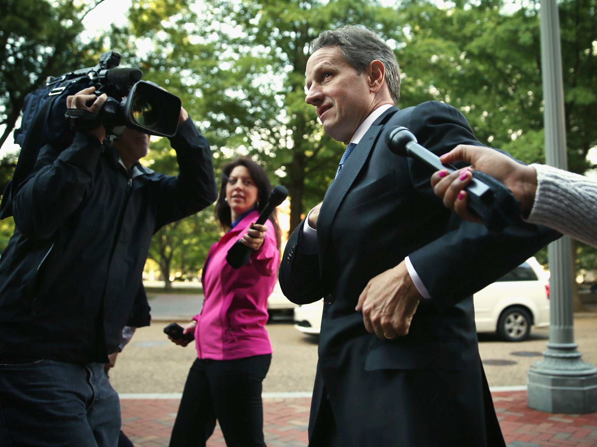 The former US Treasury Secretary Tim Geithner arrives at Court to testify at the AIG trial