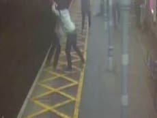 CCTV footage shows blind and deaf man pushed onto train tracks