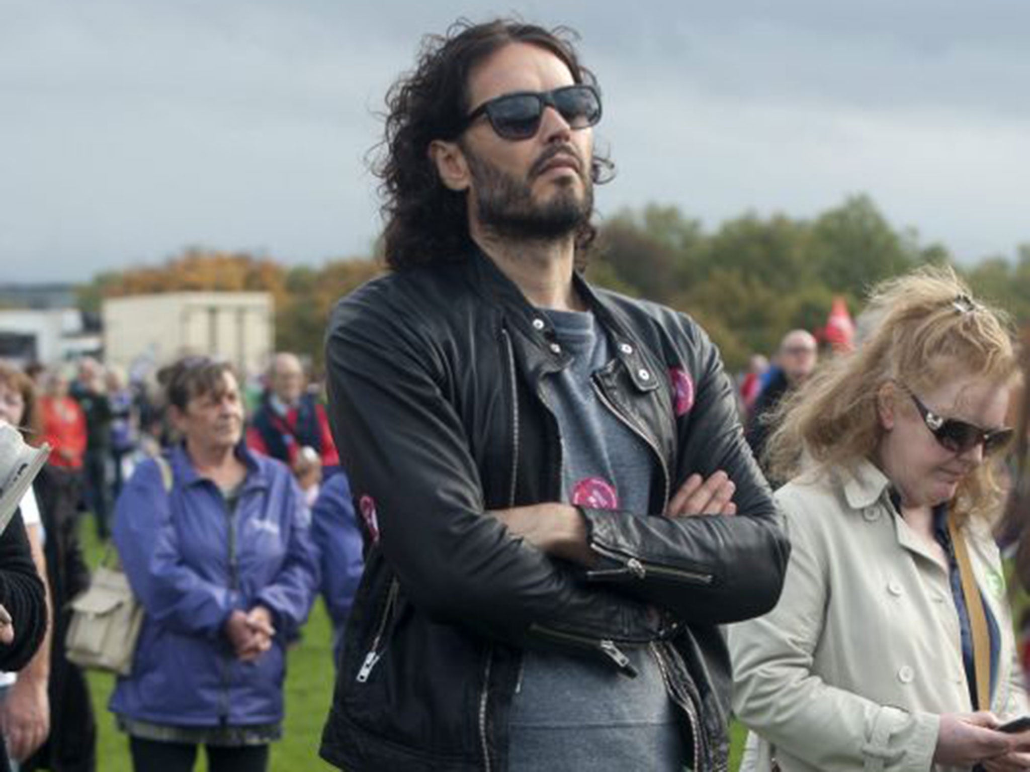 Russell Brand appeared on Newsnight, squeezing Evan Davis' knee at every available opportunity (EPA)