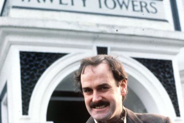 John Cleese as Basil Fawlty, whose hotel is a byword for poor service