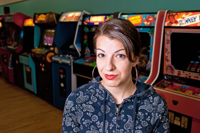 Anita Sarkeesian, a female gamer who has been bombarded with abuse during the #GamerGate campaign