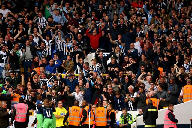 Ayoze Perez celebrates in front of the Newcastle fans