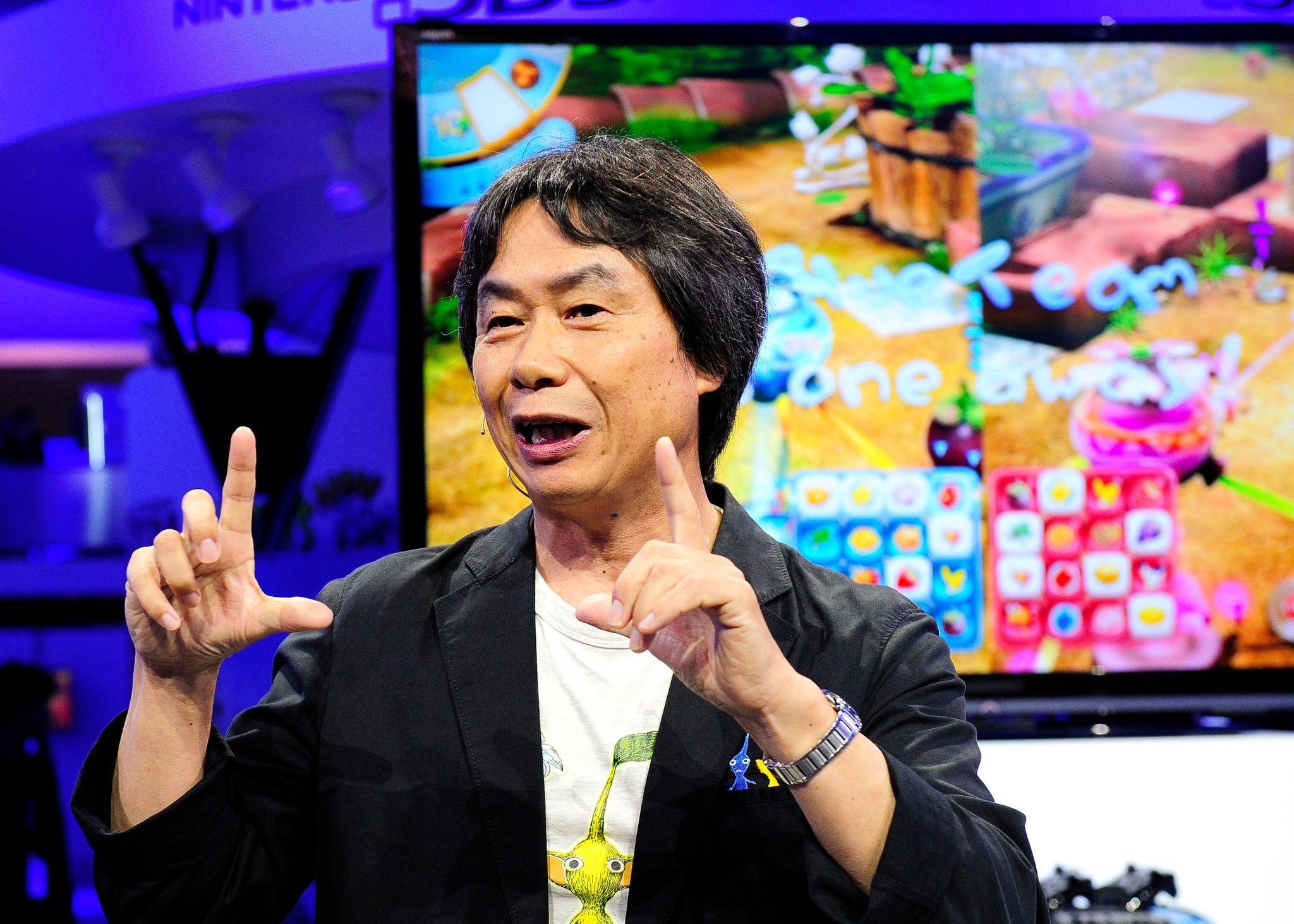 Shigeru Miyamoto speaking at the Pikmin 3 unveiling at E3 in 2013.
