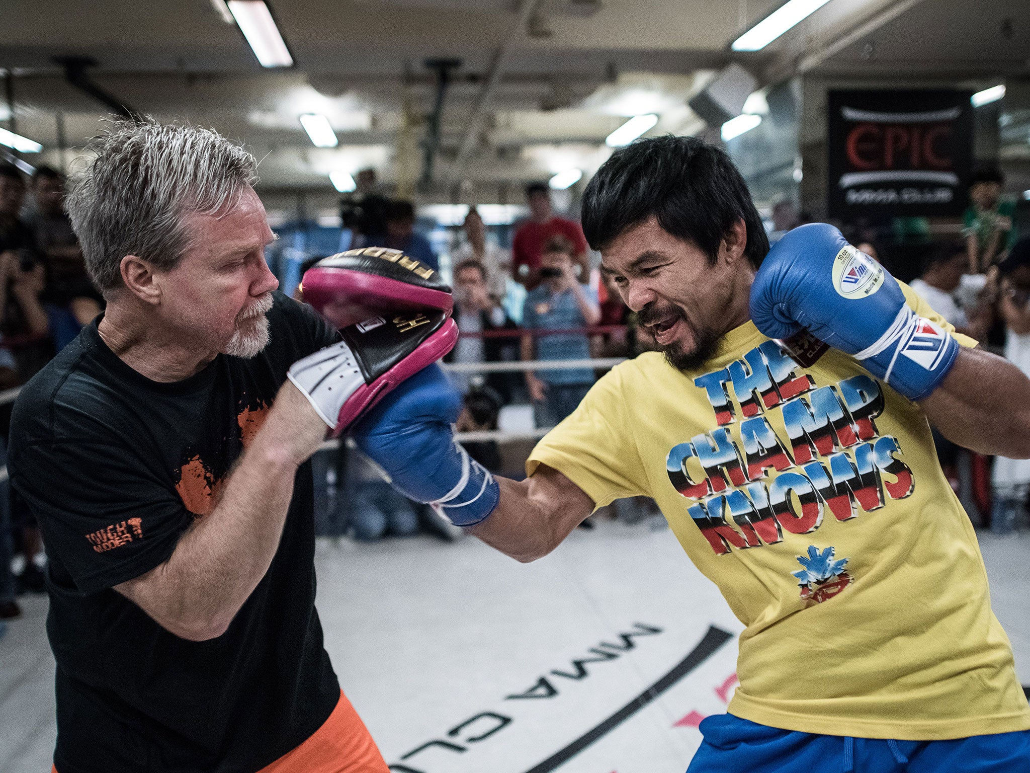 Manny Pacquiao and his trainer Freddy Roach in Hong Kong as he prepares for the Algeri fight