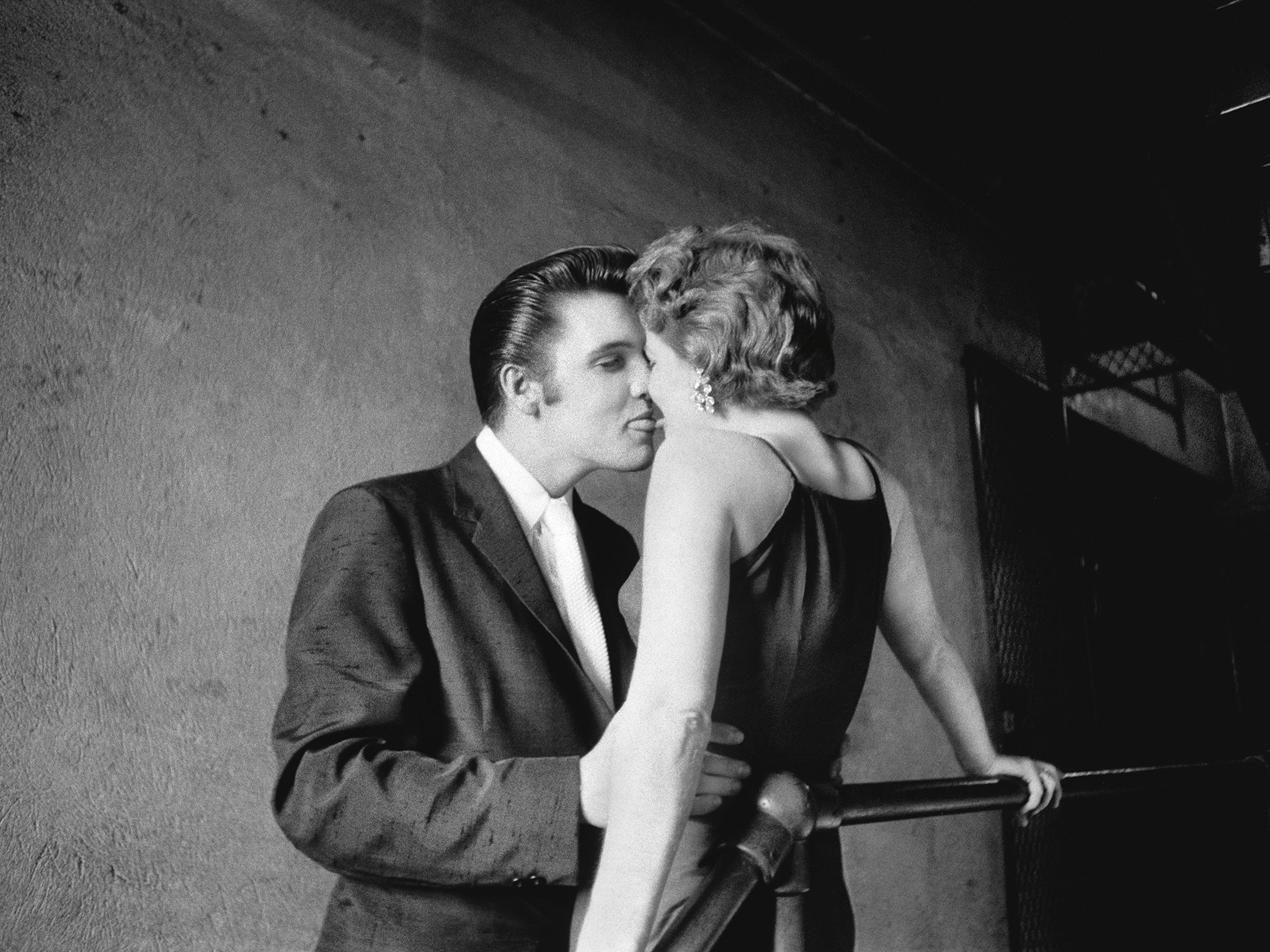 The Kiss’ captured Elvis with a fan backstage in Richmond, Virginia in 1956. The image is Wertheimer's most iconic photograph