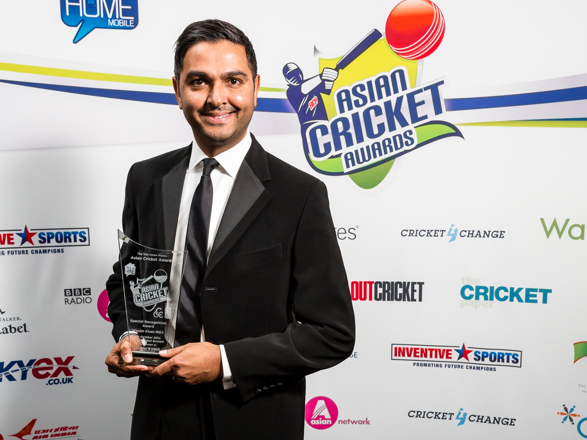 Wasim Khan winner of the Founders Special Recognition award poses with the trophy during the Asian Cricket Awards at Lords