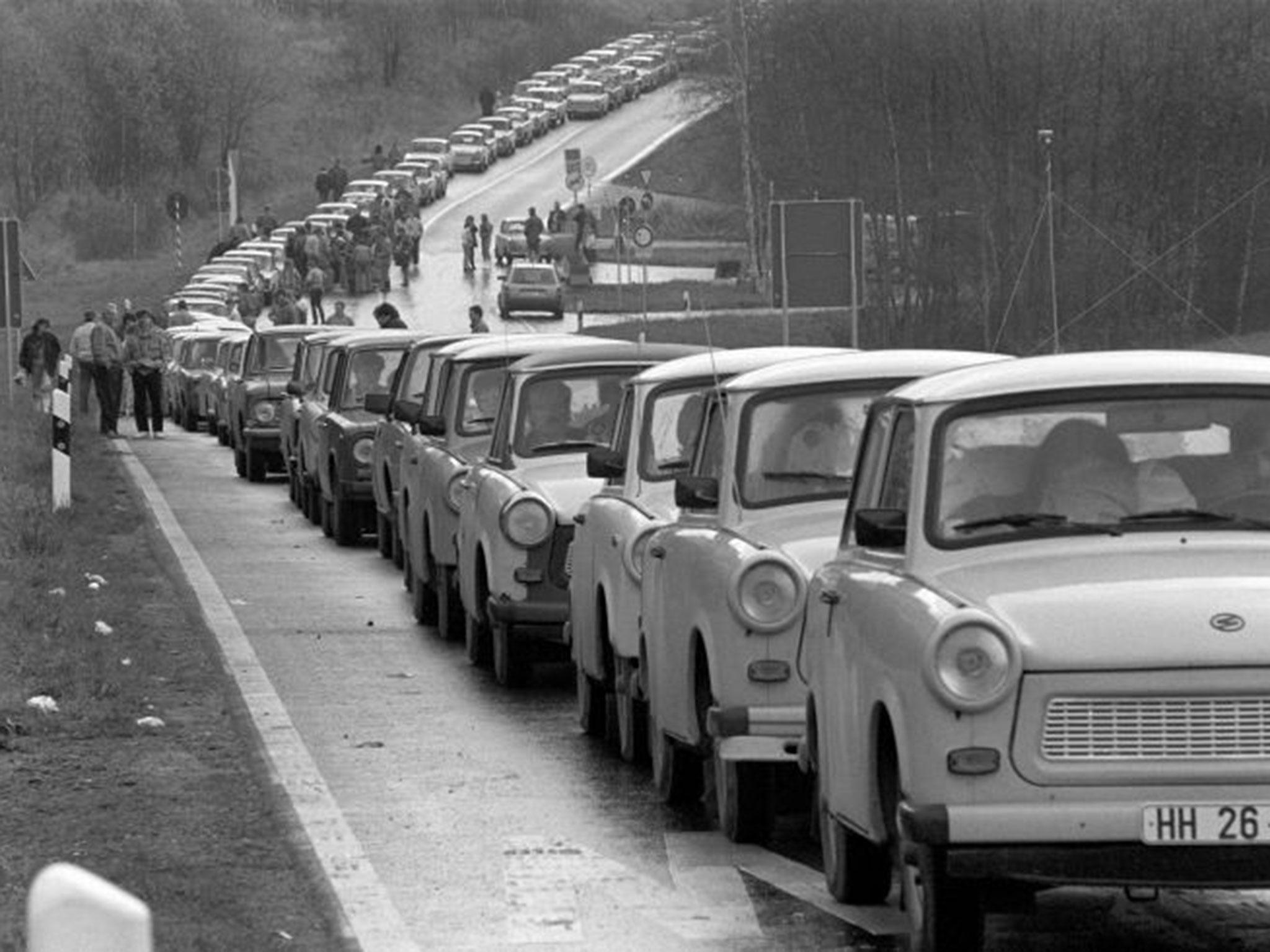 East German drivers queue at the Schirnding border crossing into Czecho-slovakia five days before the fall of the Berlin
