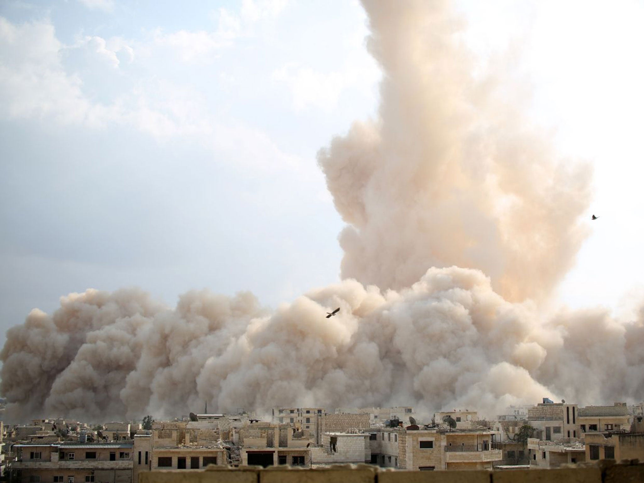 An explosion hitting a Syrian army military outpost in Idlib province. The blast was reportedly caused by fighters belonging to the Ahrar al-Sham brigade, part of a rebel coalition 