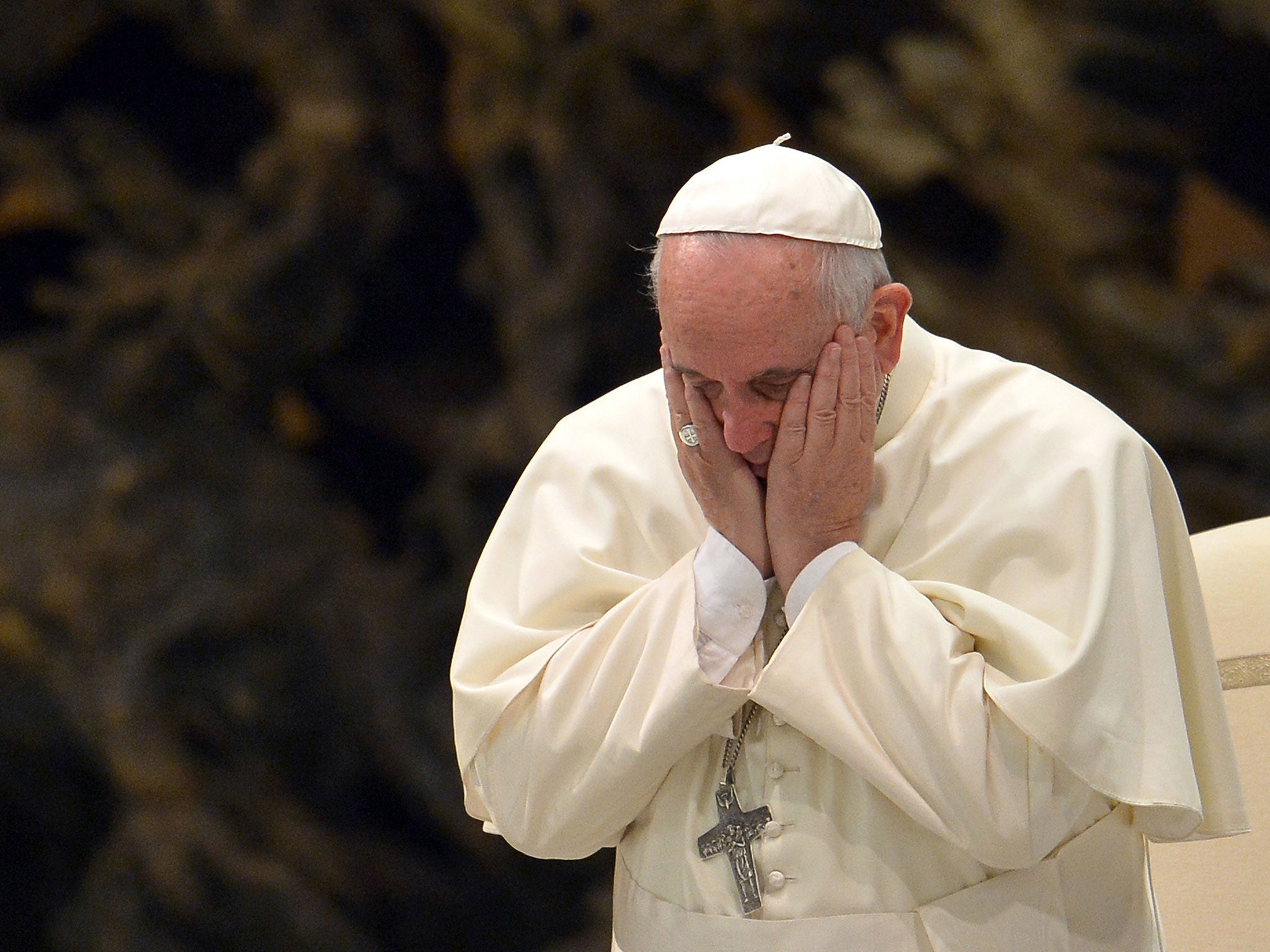 Pope Francis gestures during his audience with members of the Schoenstatt movement at the Paul VI hall on October 25, 2014 at the Vatican