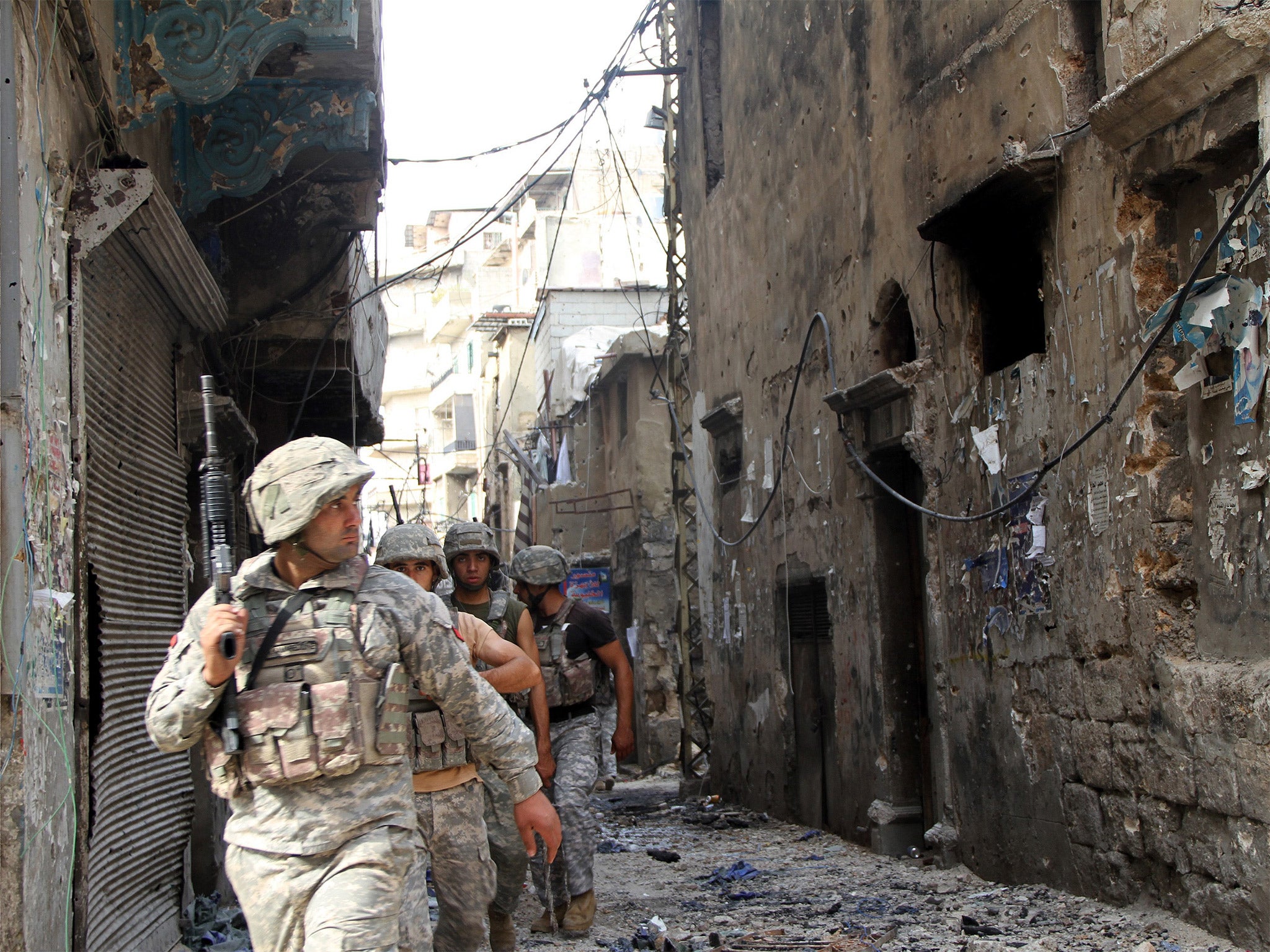 Lebanese soldiers patrol in the Bab al-Tabbaneh area of Tripoli
