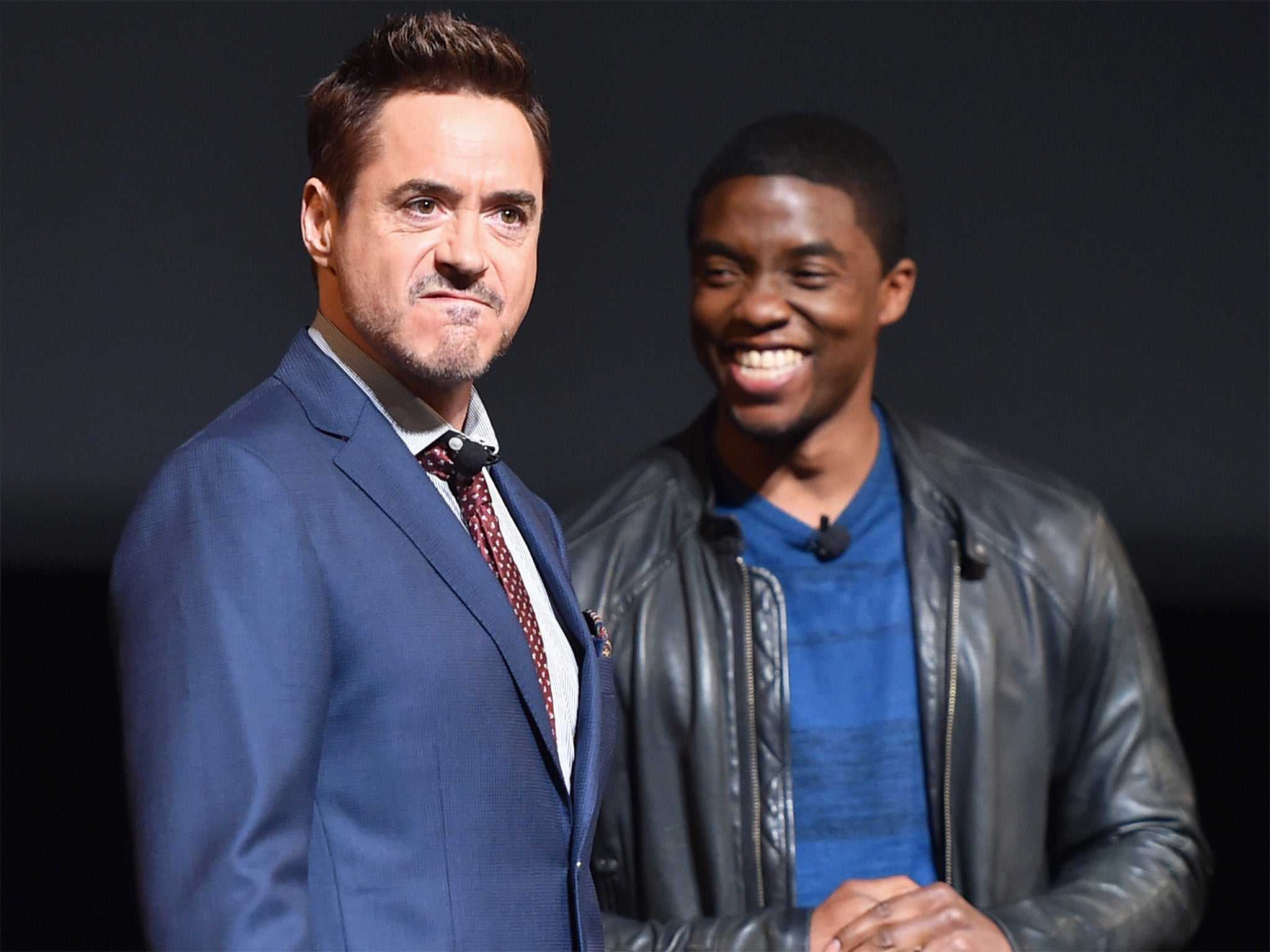 Robert Downey Jr with Chadwick Boseman - who will play Black Panther in a movie due for released in 2017 - onstage during Marvel Studios fan event at The El Capitan Theatre in Los Angeles, California