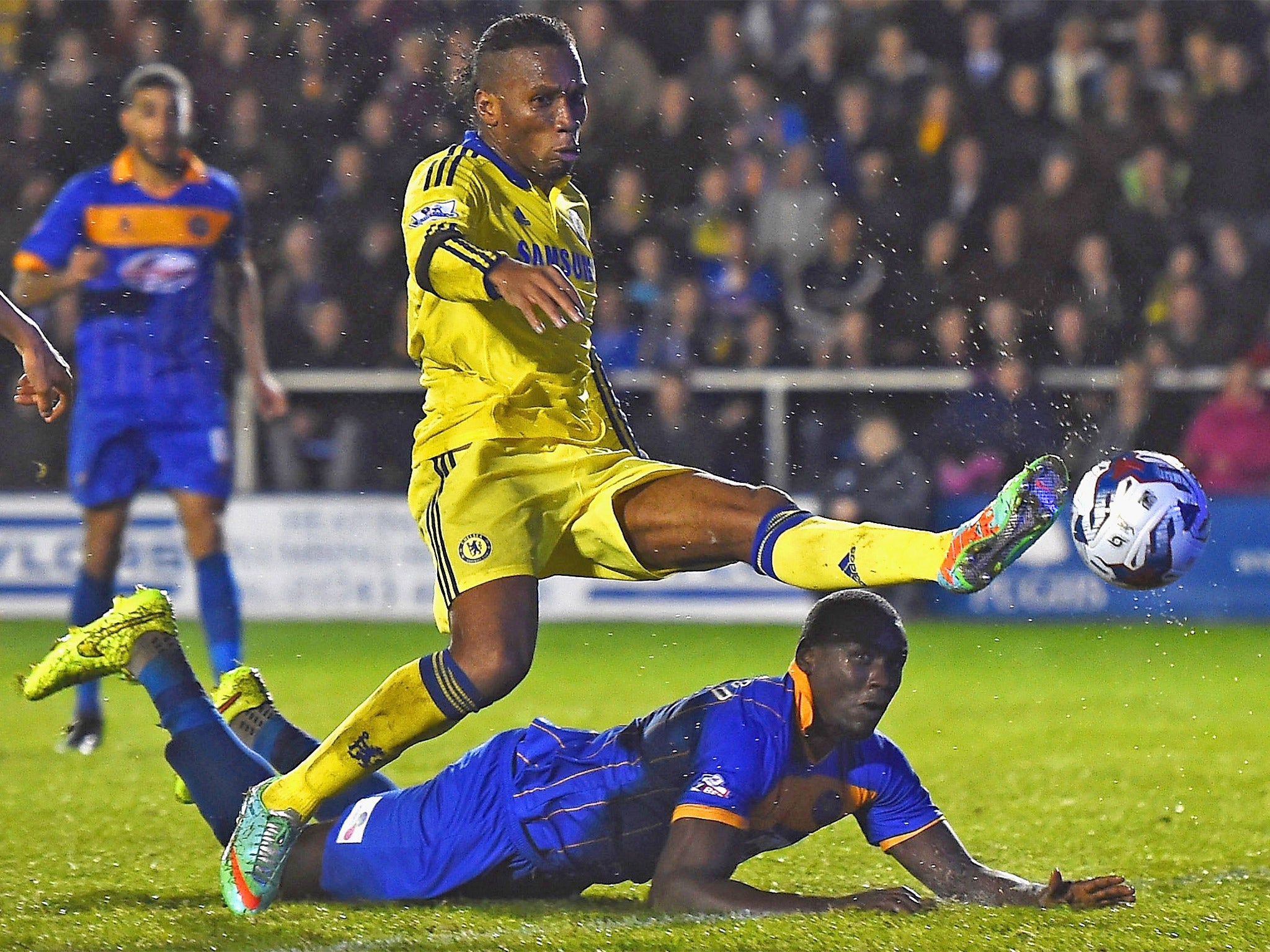 Jermaine Grandison heads into his own net under pressure from Didier Drogba