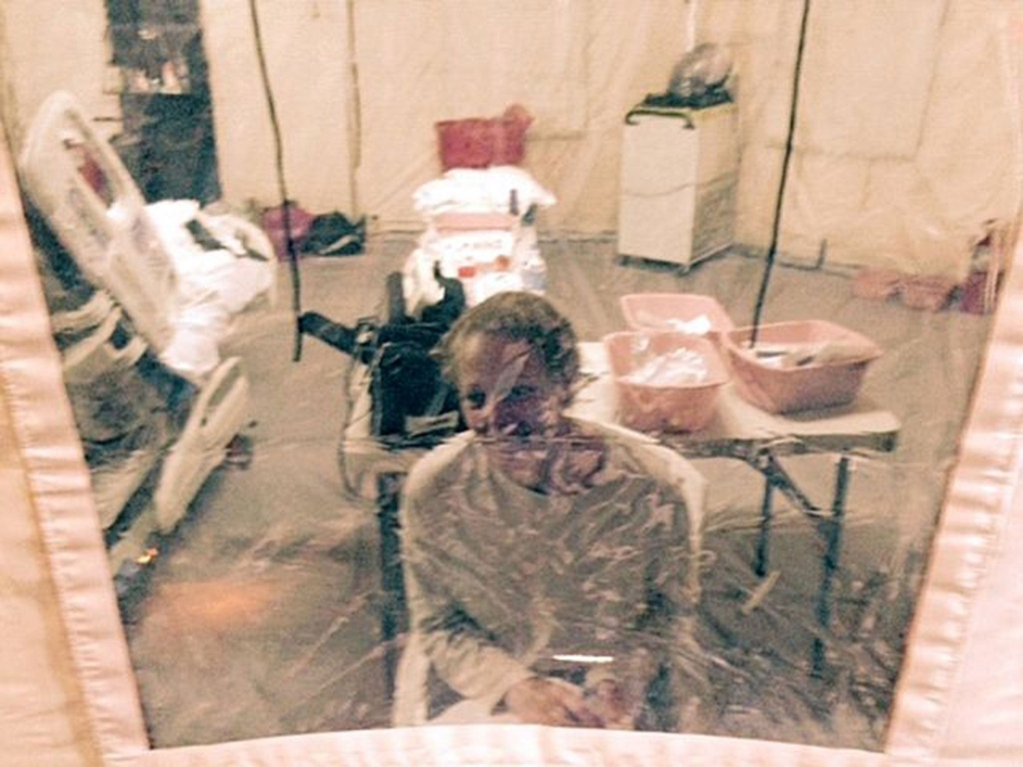 Nurse Kaci Hickox in an isolation tent at University Hospital in Newark, New Jersey