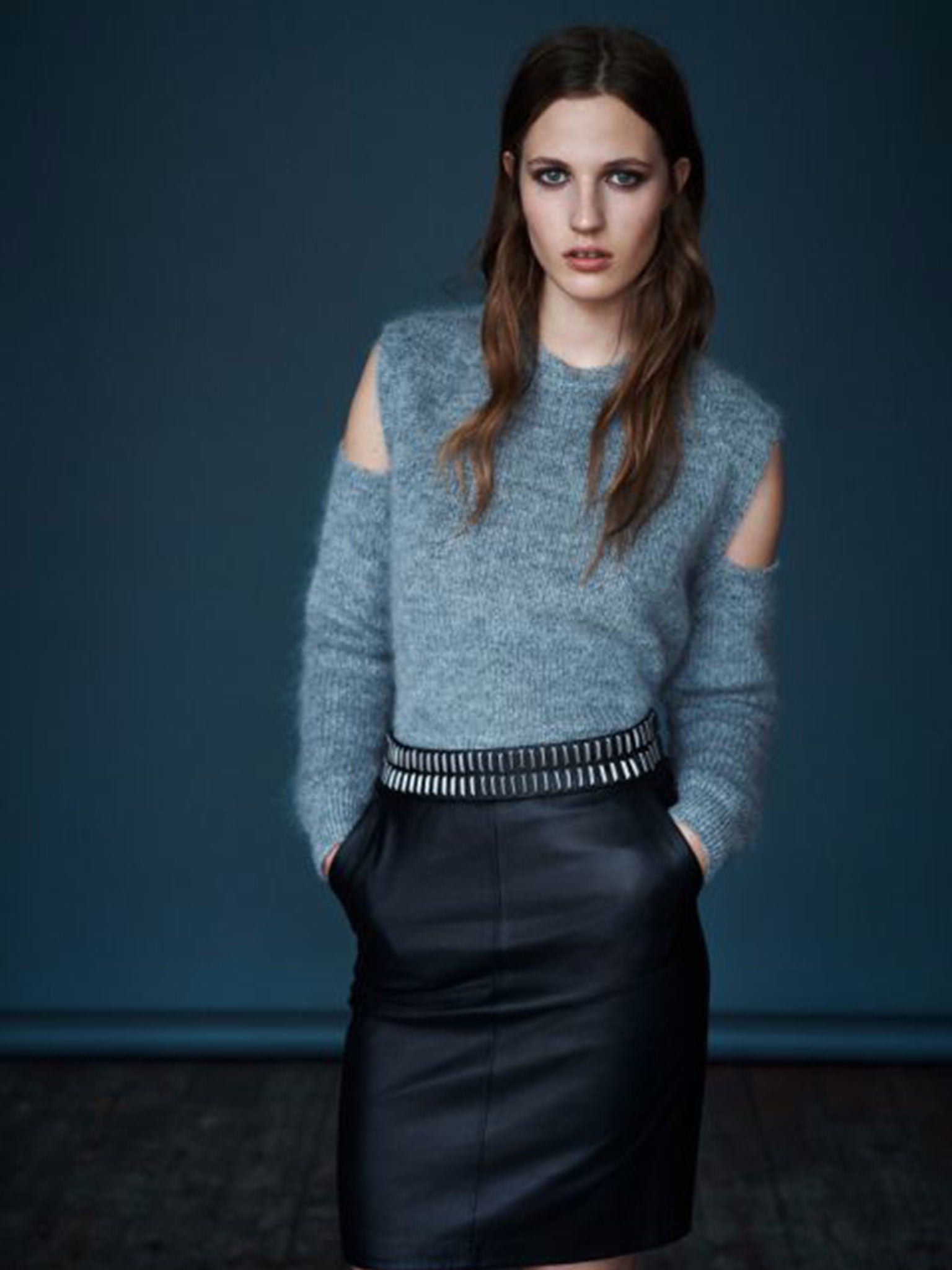 Model wears grey knit £188, skirt £188; AllSaints, allsaints.com