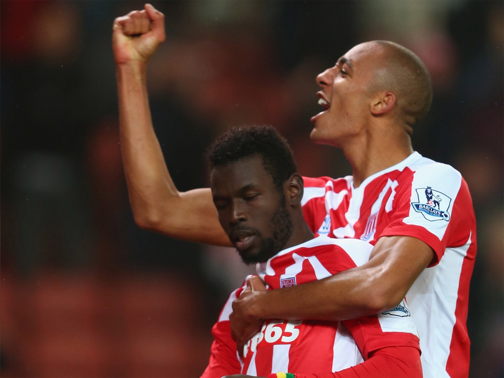 Goalscorer Mame Diouf celebrates with Steven Nzonzi after Stoke equalise - but the jubilation was short-lived