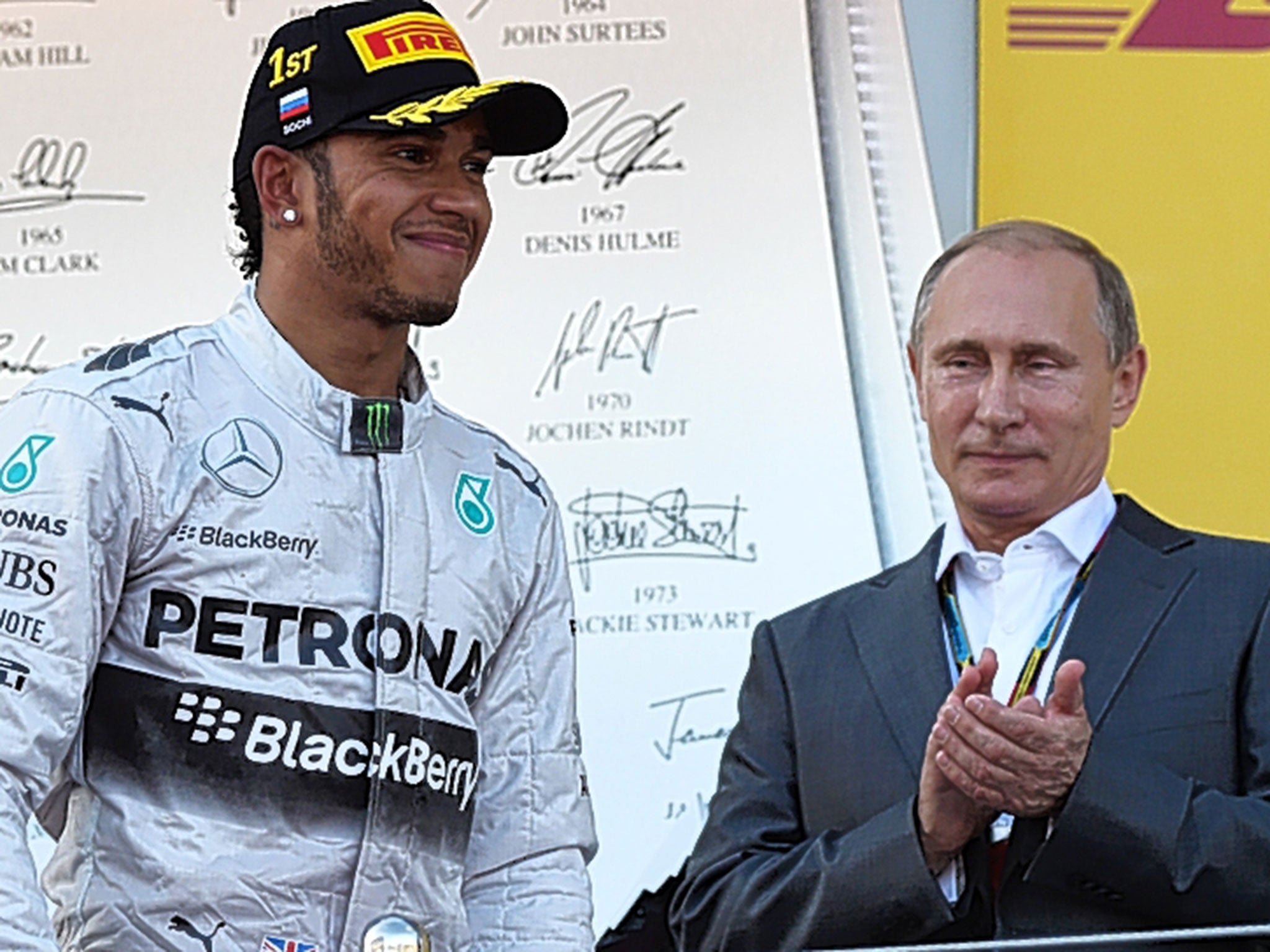 The Formula One title leader Lewis Hamilton is applauded by President Vladimir Putin at the inaugural Russian GP this month
