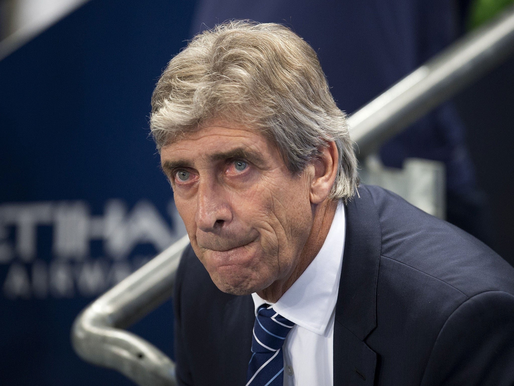 Pellegrini looks on during Manchester City's 2-0 defeat to Newcastle