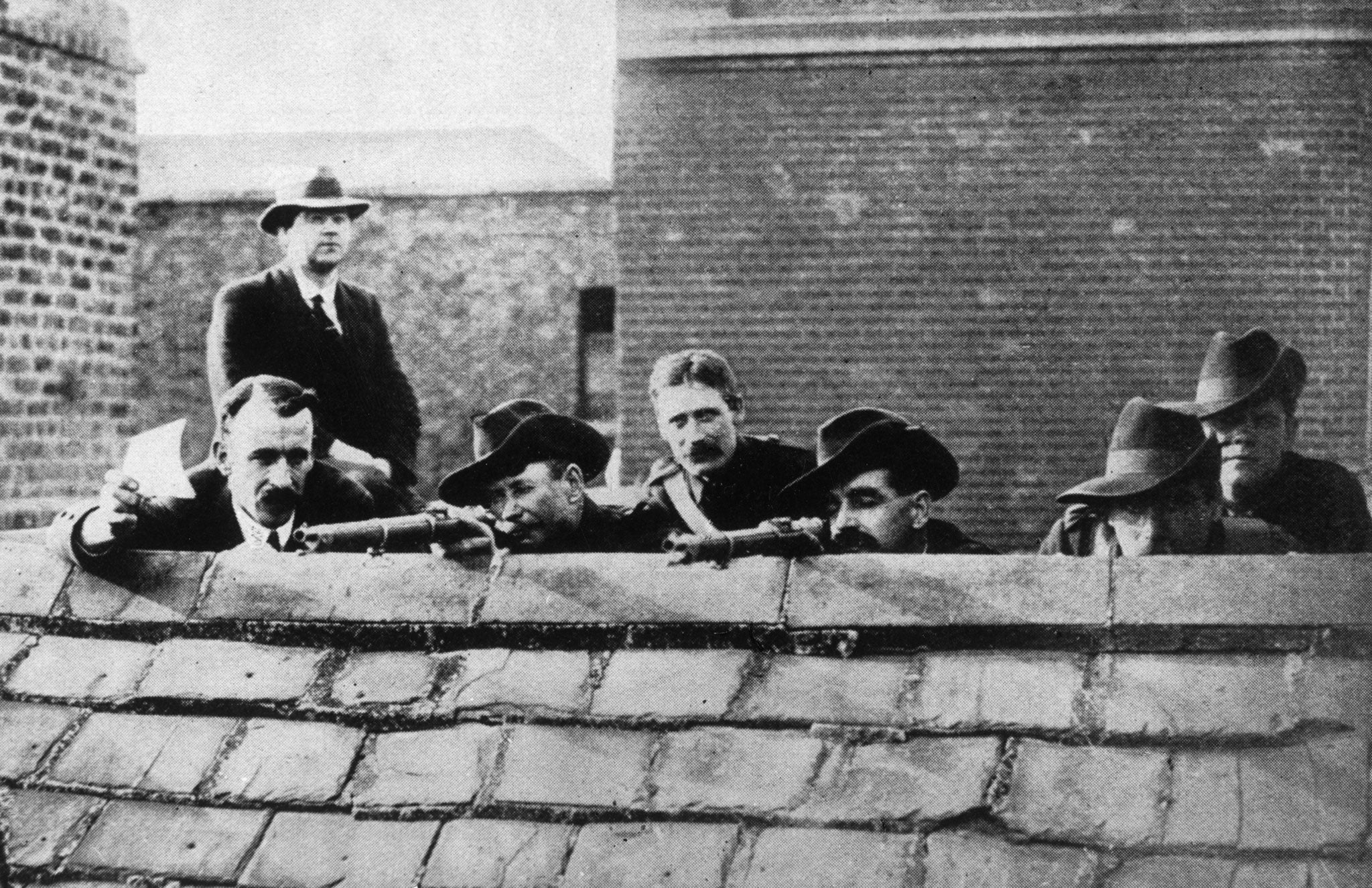 The price of freedom: Irish rebels take cover on a rooftop during the Easter Rising