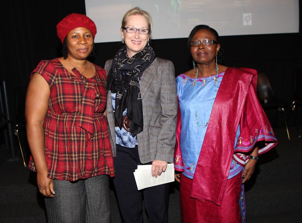 Global campaign: Dorkenoo (right) with fellow campaigners against FGM, Fauziya T
Kassindja and Meryl Streep, in 2009