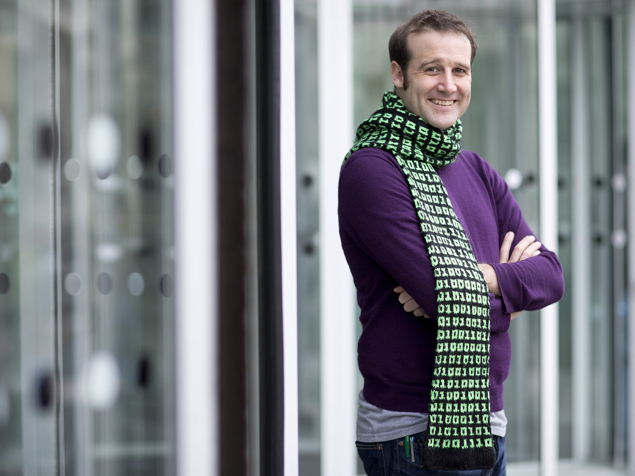 Go figure: Matt Parker, wearing the binary code scarf knitted by his mother