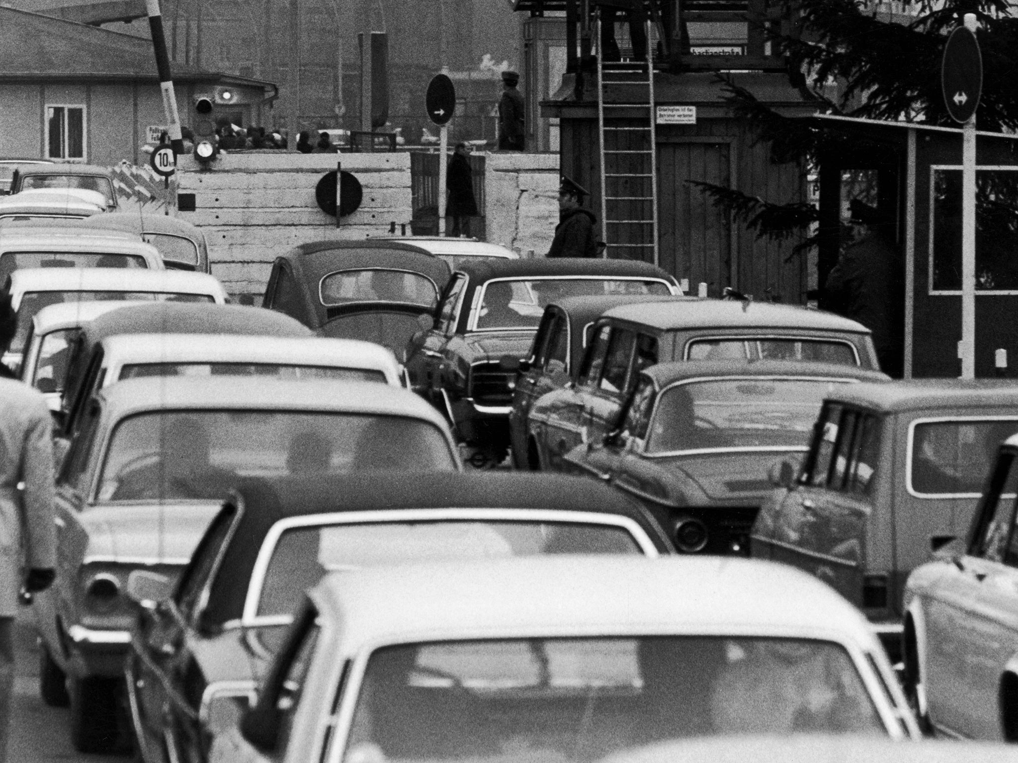 People waiting to go through the checkpoint to East Berlin in 1965