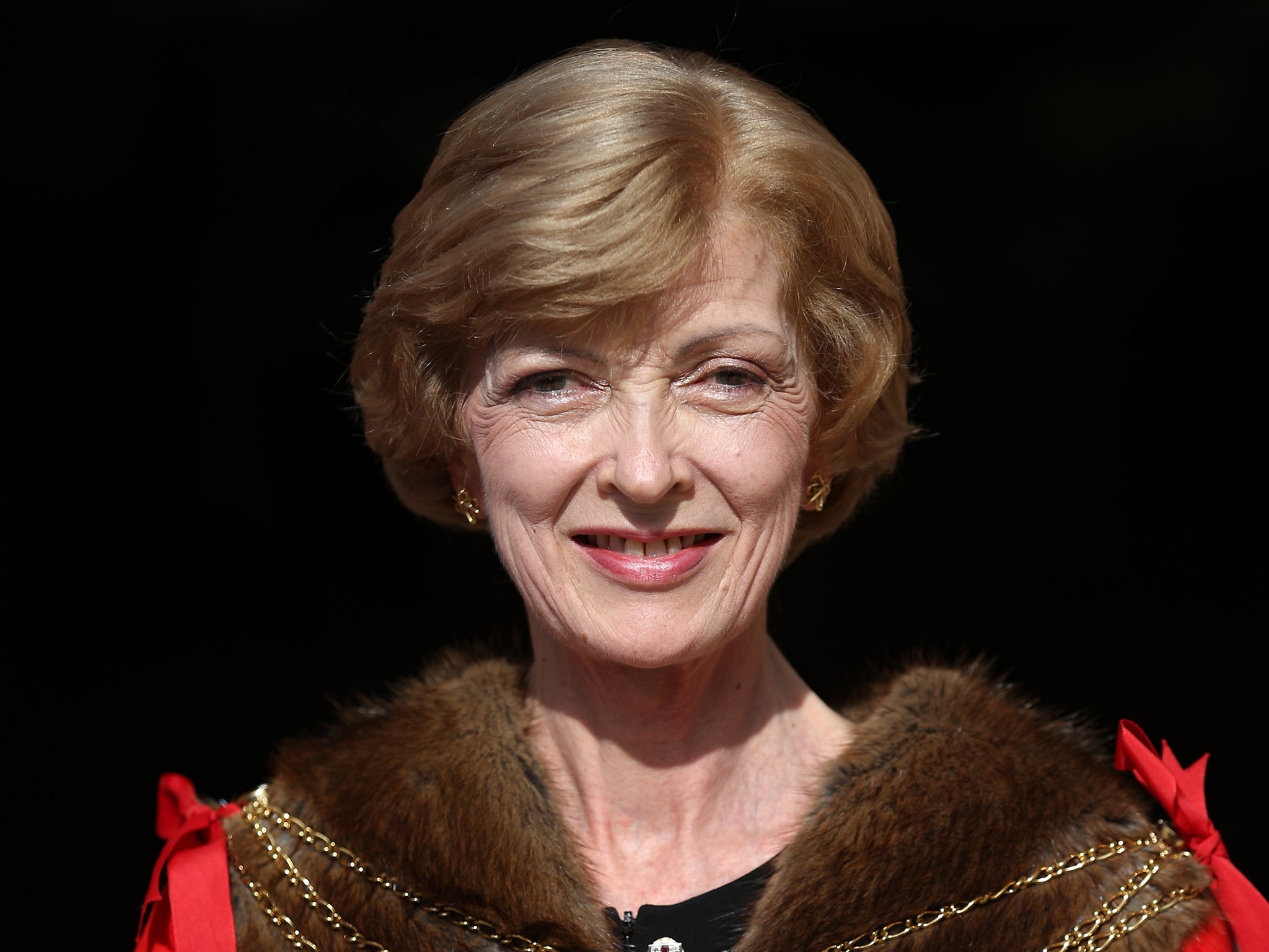 Critics of Fiona Woolf say she should step down amid accusations of an establishment cover-up