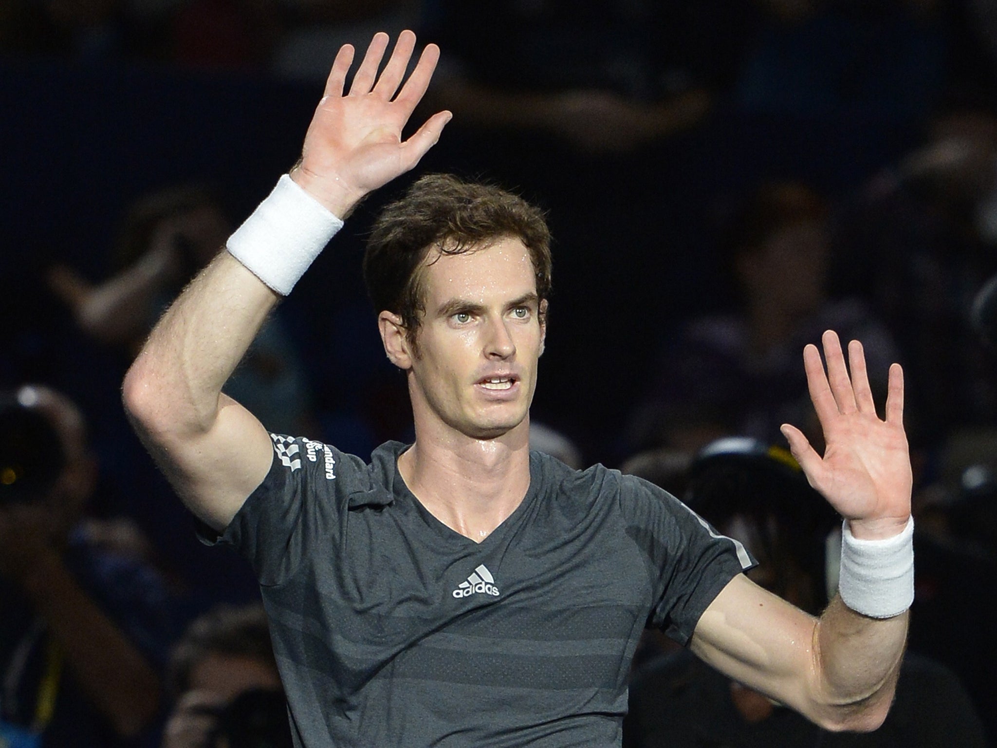 Andy Murray enjoys victory over Grigor Dimitrov at the Paris Masters yesterday