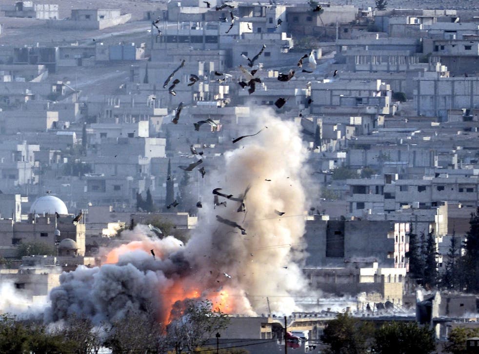 An explosion after an apparent US-led coalition airstrike on Kobane, Syria
